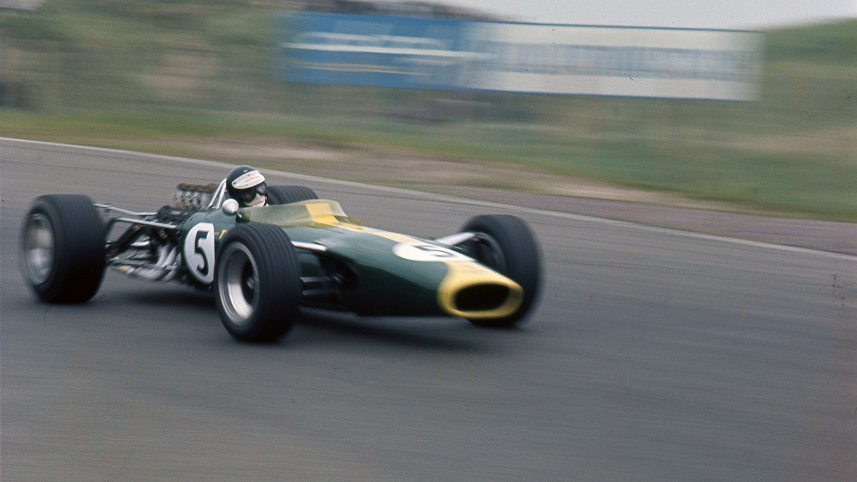Jim Clark's Lotus 49 with the Ford Cosworth DFV racing to victory at the 1967 Dutch Grand Prix