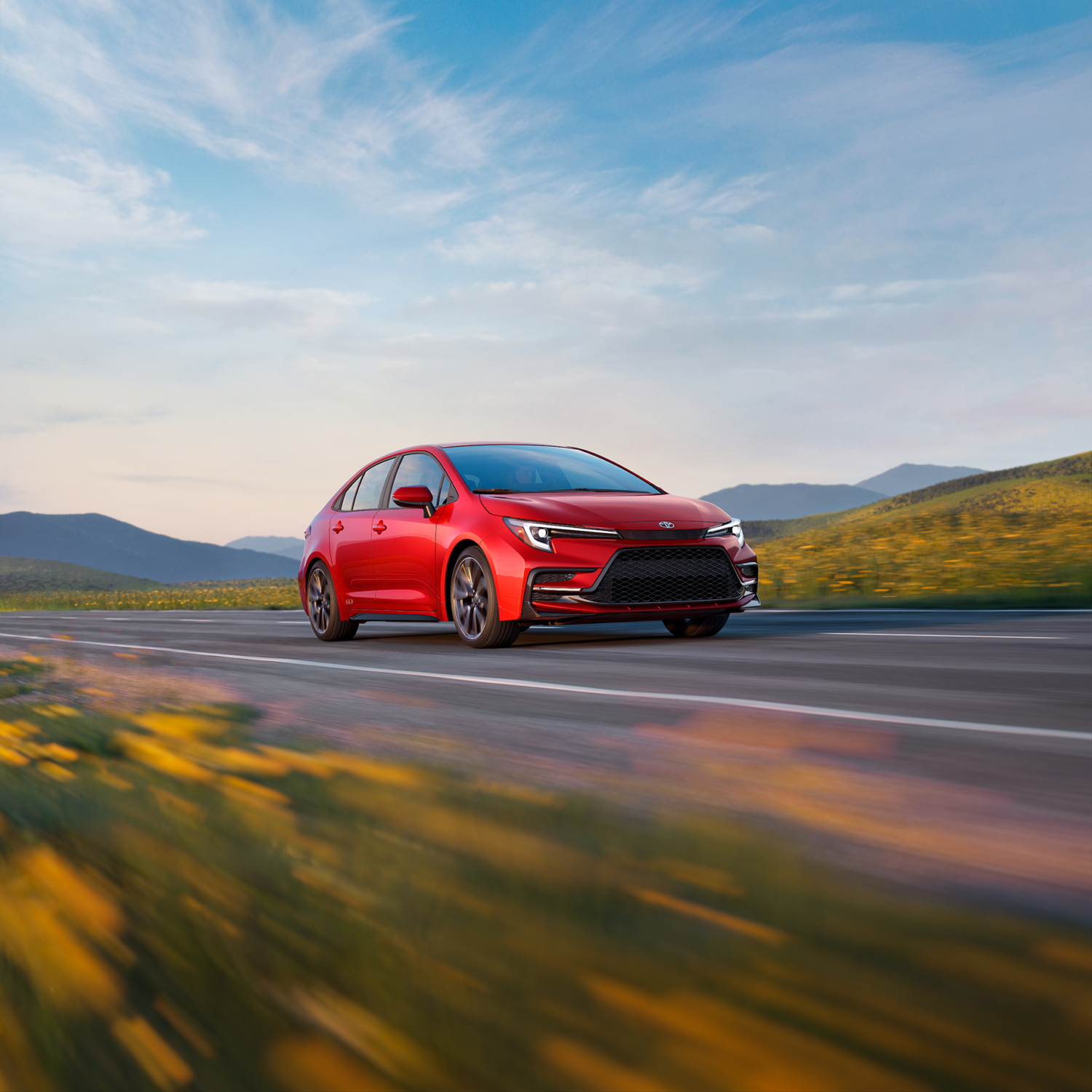 2027 Toyota Corolla 60th Anniversary Special Edition in Supersonic Red, front three-quarter view
