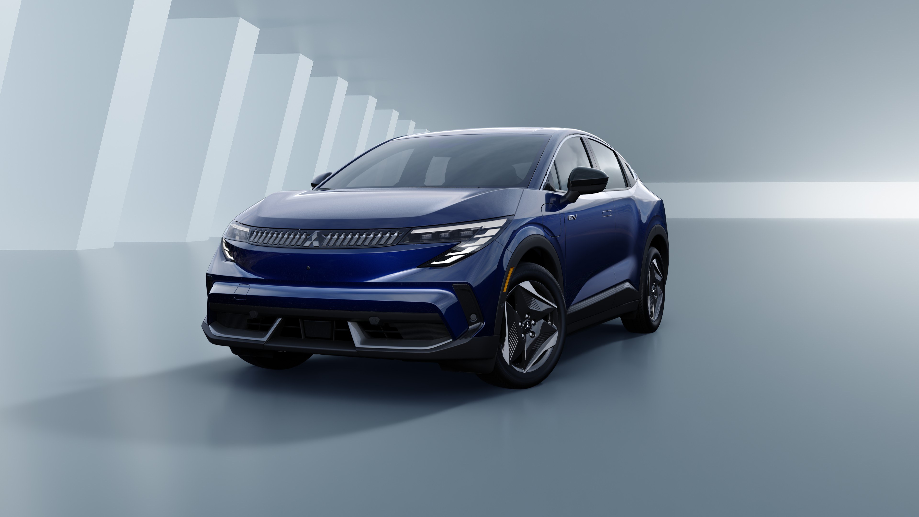 2027 Mitsubishi Eclipse Sportback EV in blue, front three-quarter studio view