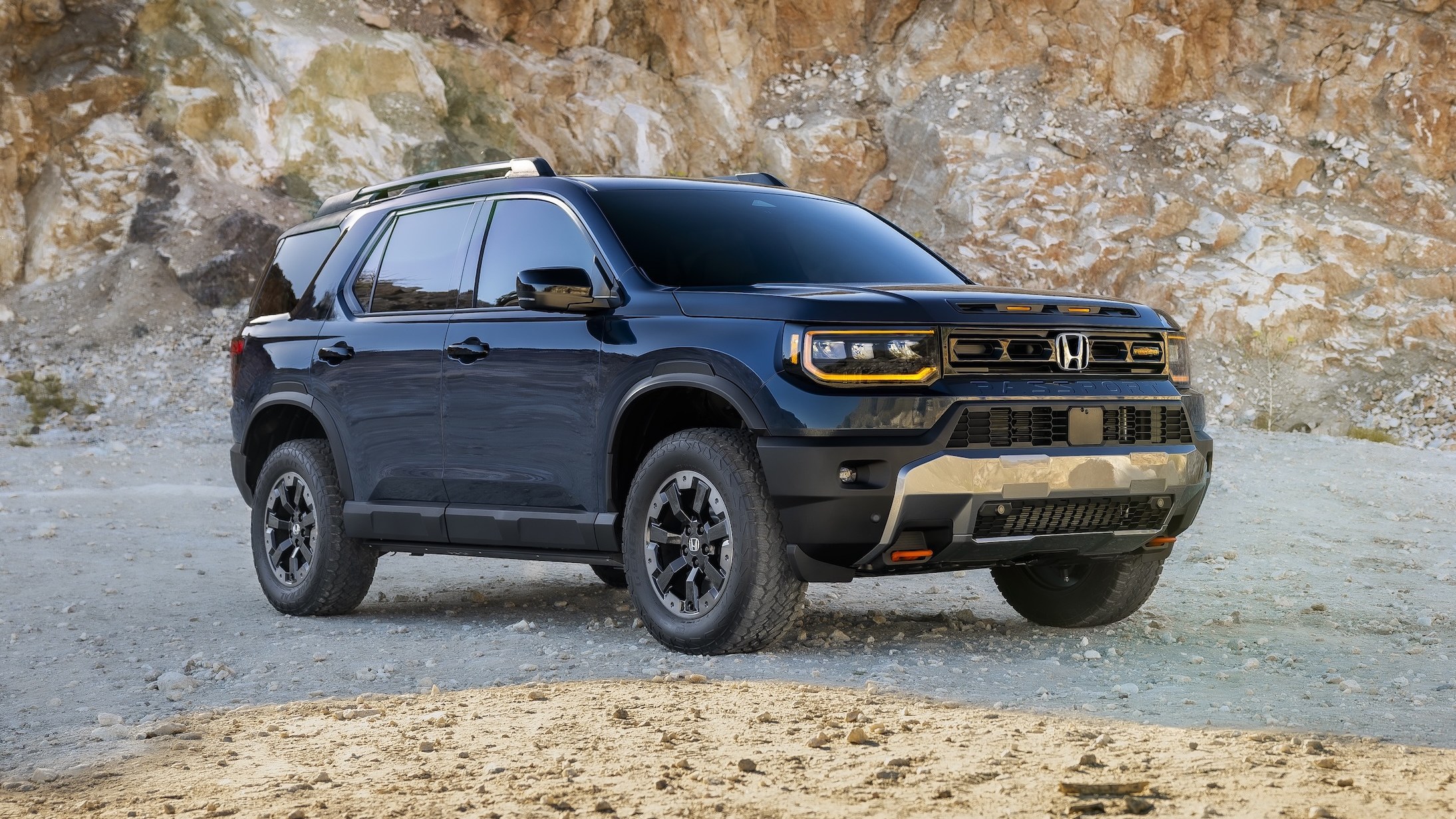 2027 Honda Passport TrailSport front three-quarter view with lifted suspension