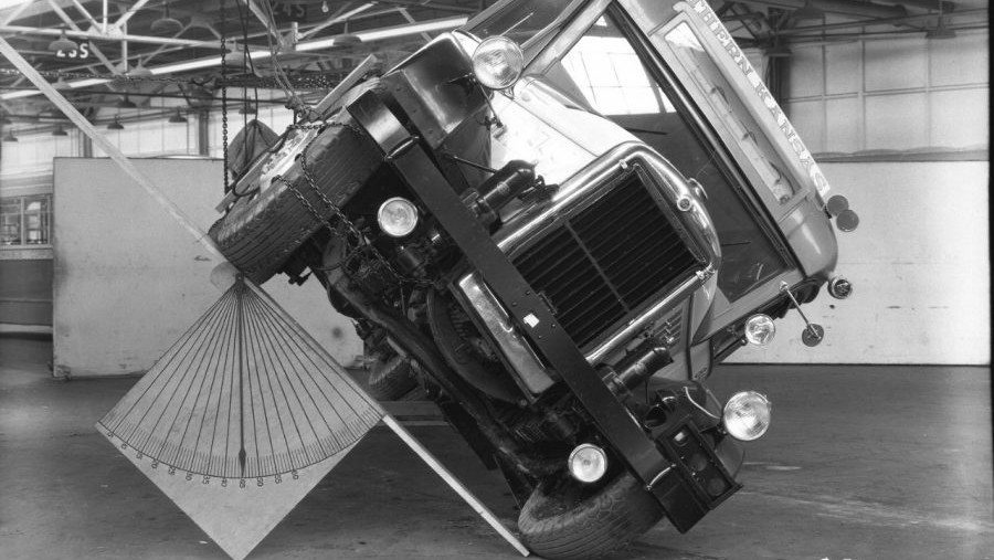 1930s GM rollover stability test with truck tilted on angled platform