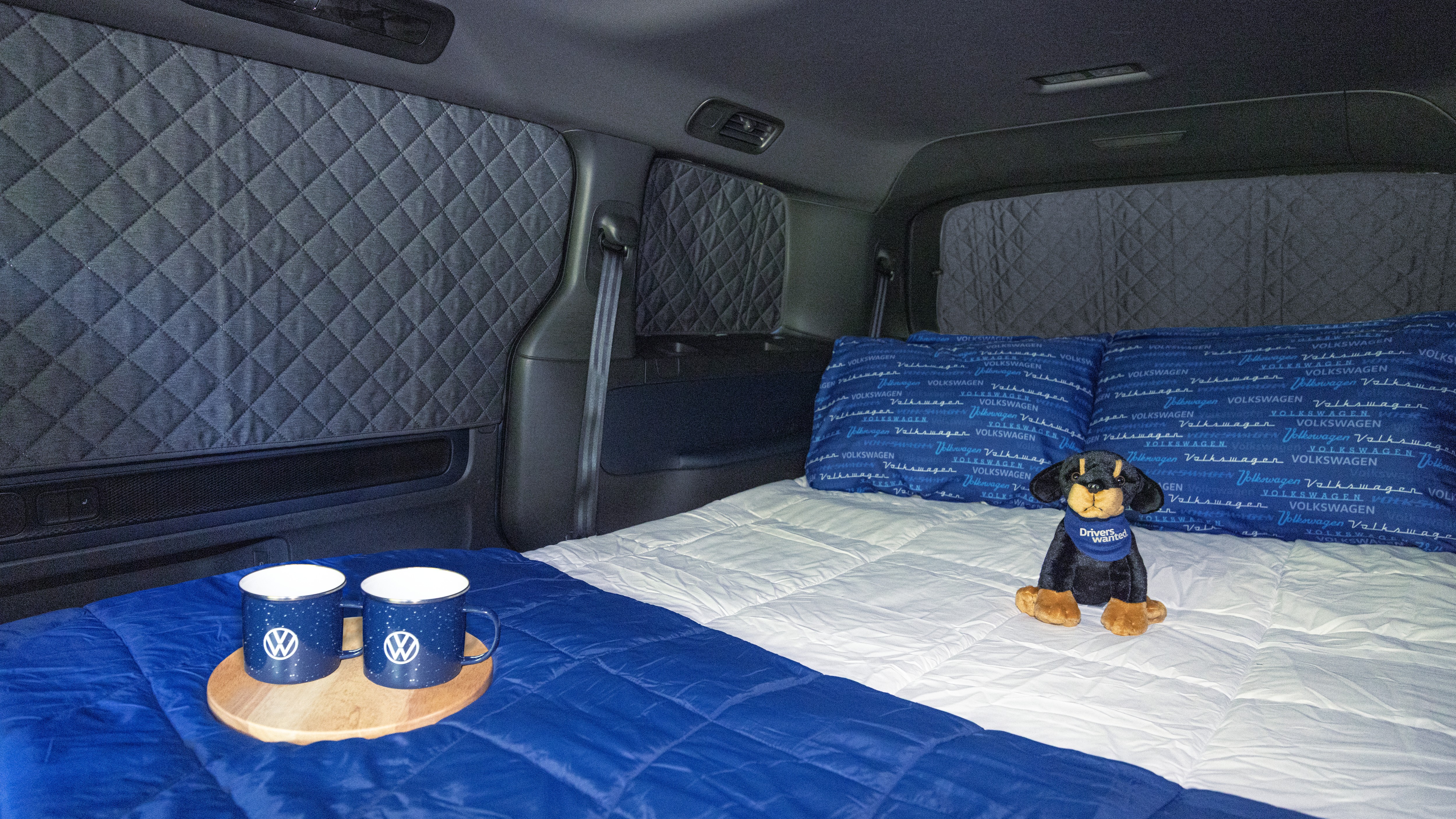 Tourer bed and window blinds inside a Volkswagen ID. Buzz
