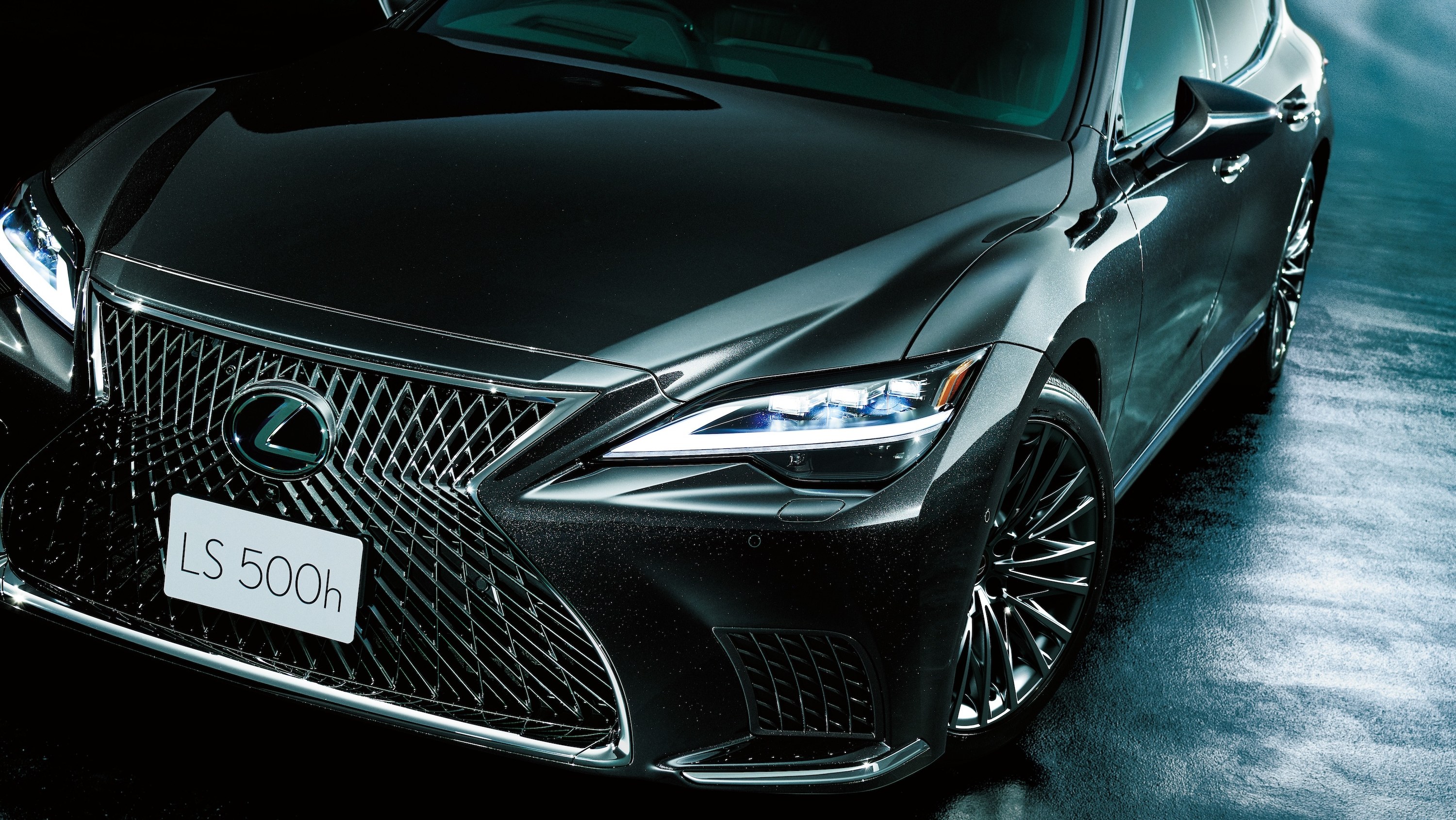 Front view of the updated 2026 Lexus LS 500h in Graphite Black Glass Flake