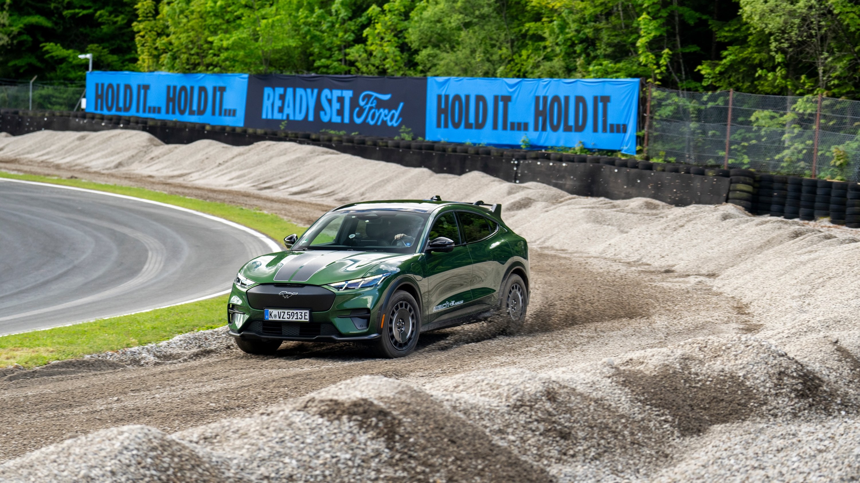 Ford Mustang Mach-E Rally sliding on gravel at the Salzburgring