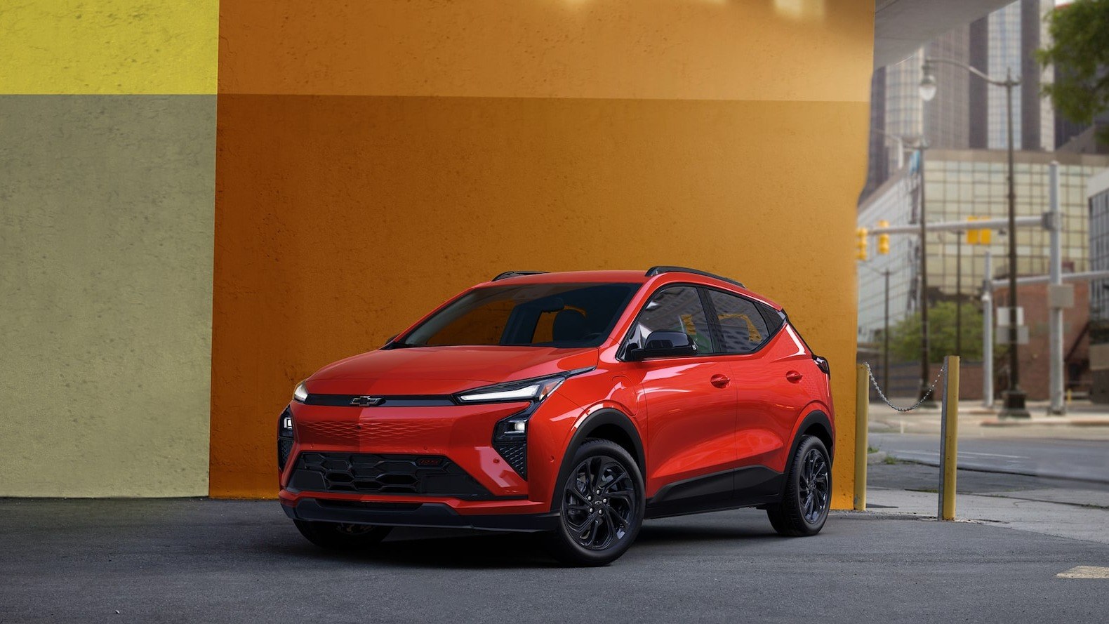 2027 Chevrolet Bolt RS in Habanero Orange, front three-quarter view