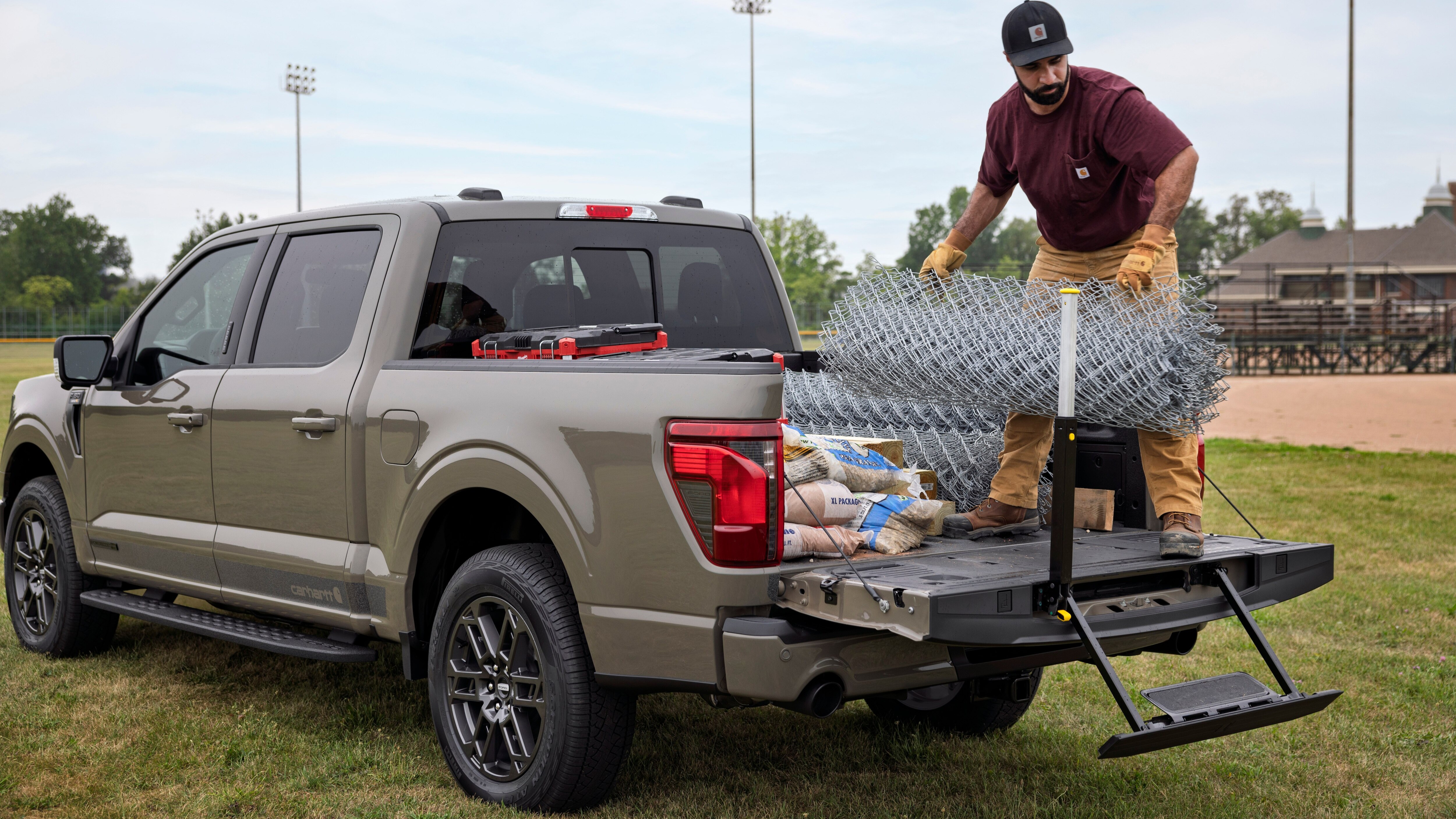 2027 Ford F-150 Carhartt rear three-quarter view with tailgate step deployed