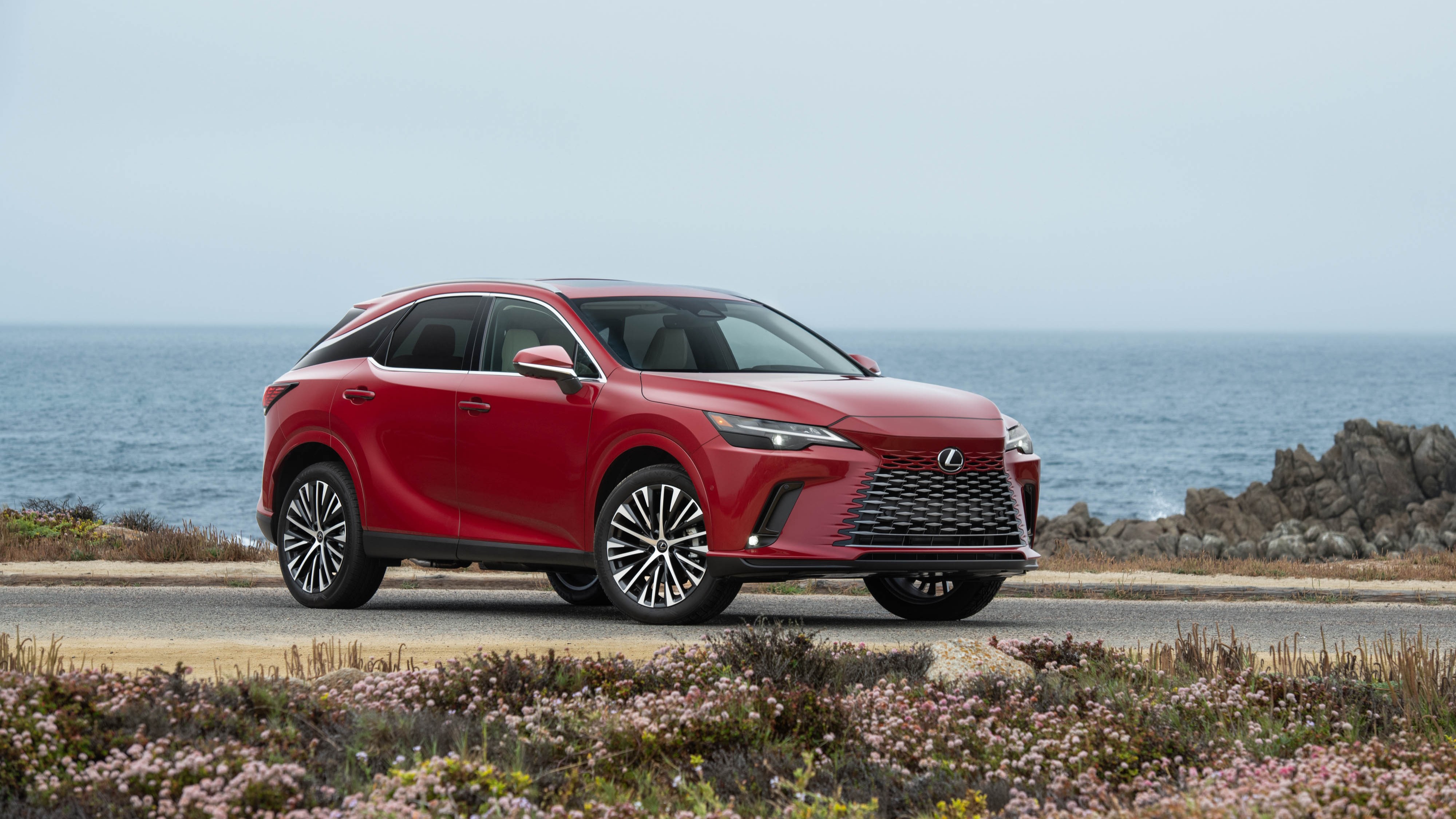 2027 Lexus RX 350h in Matador Red Mica, front three-quarter view