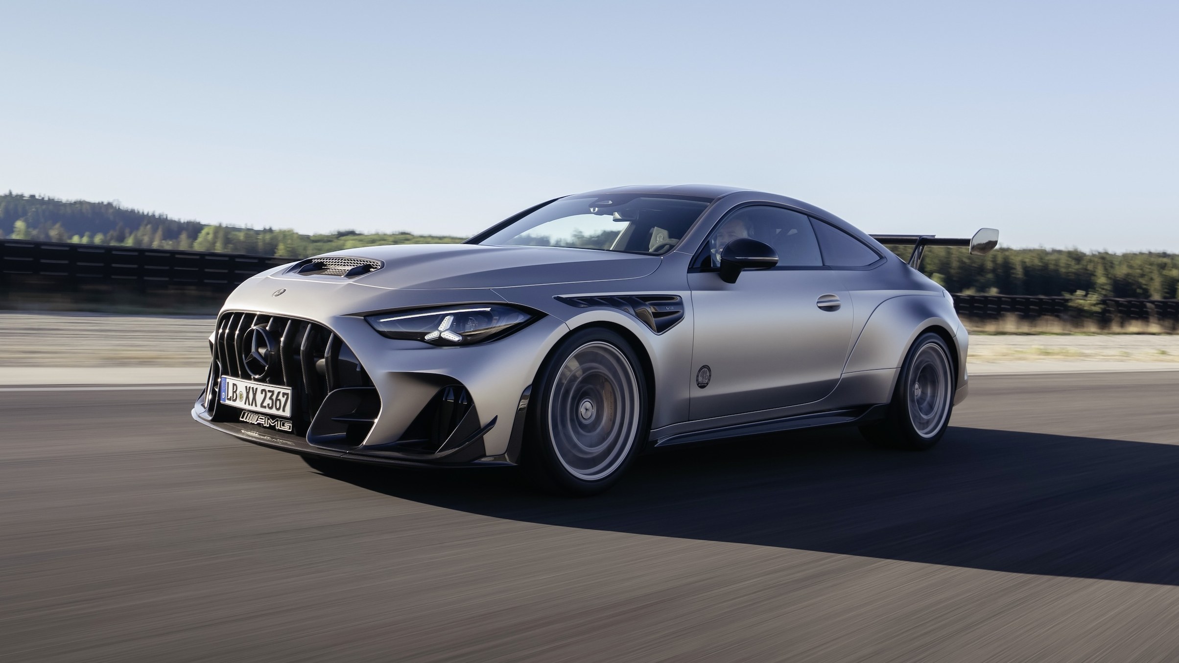 Mercedes-AMG CLE 646 Spezialanfertigung driving on track, front three-quarter view