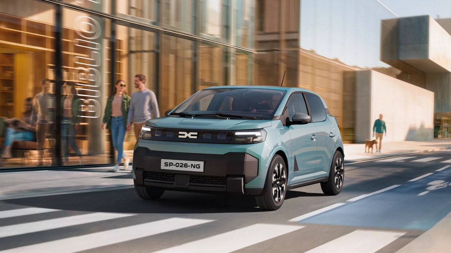 New Dacia Spring electric city car, front three-quarter view in Agave