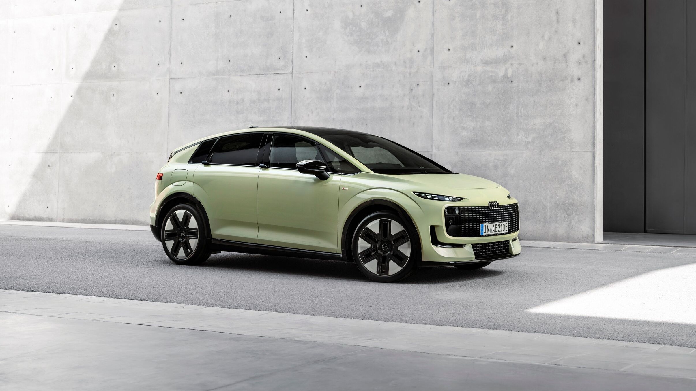 Audi A2 e-tron in pistachio green, front three-quarter view