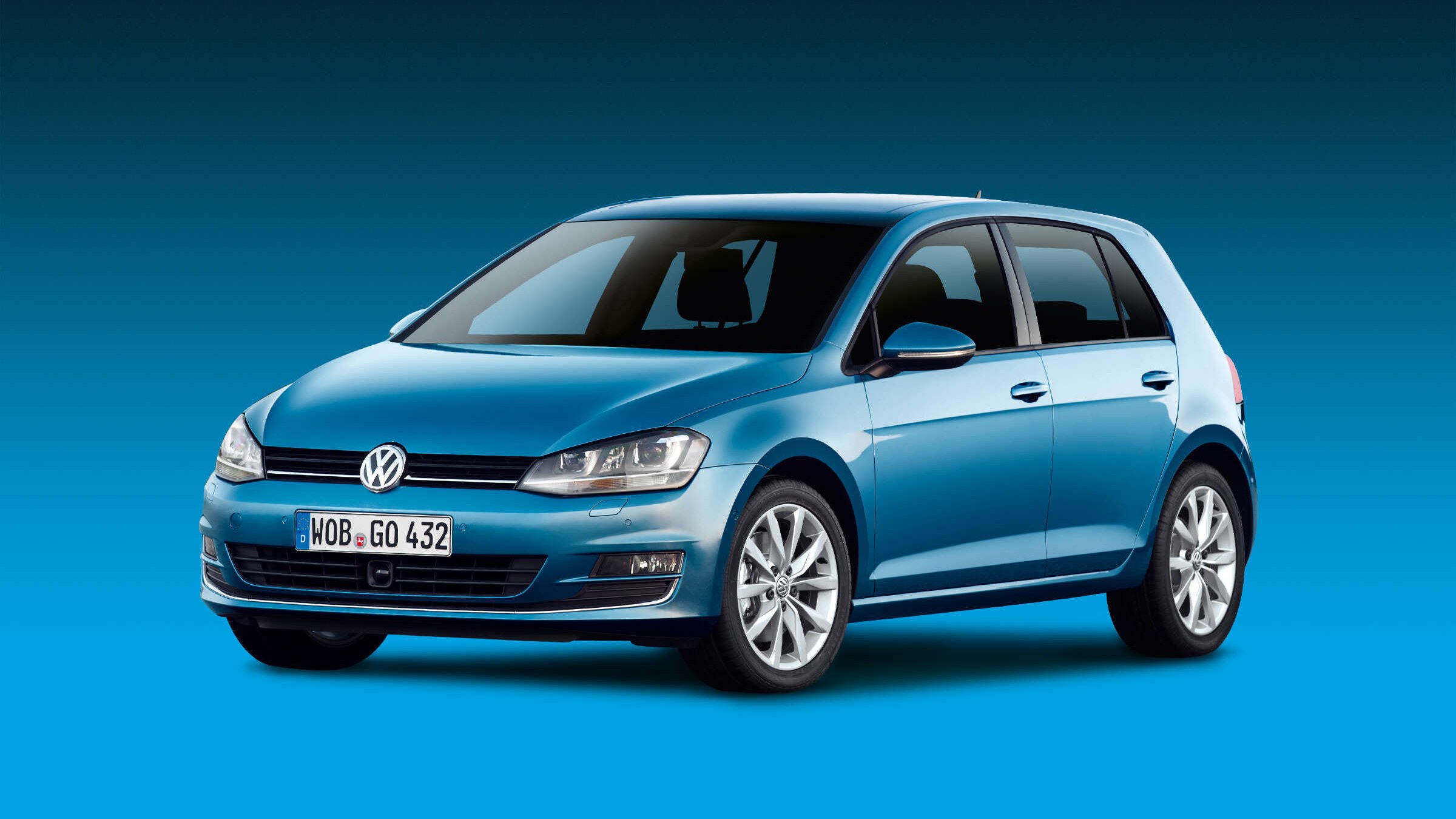 Blue Volkswagen Golf VII hatchback, front three-quarter studio view