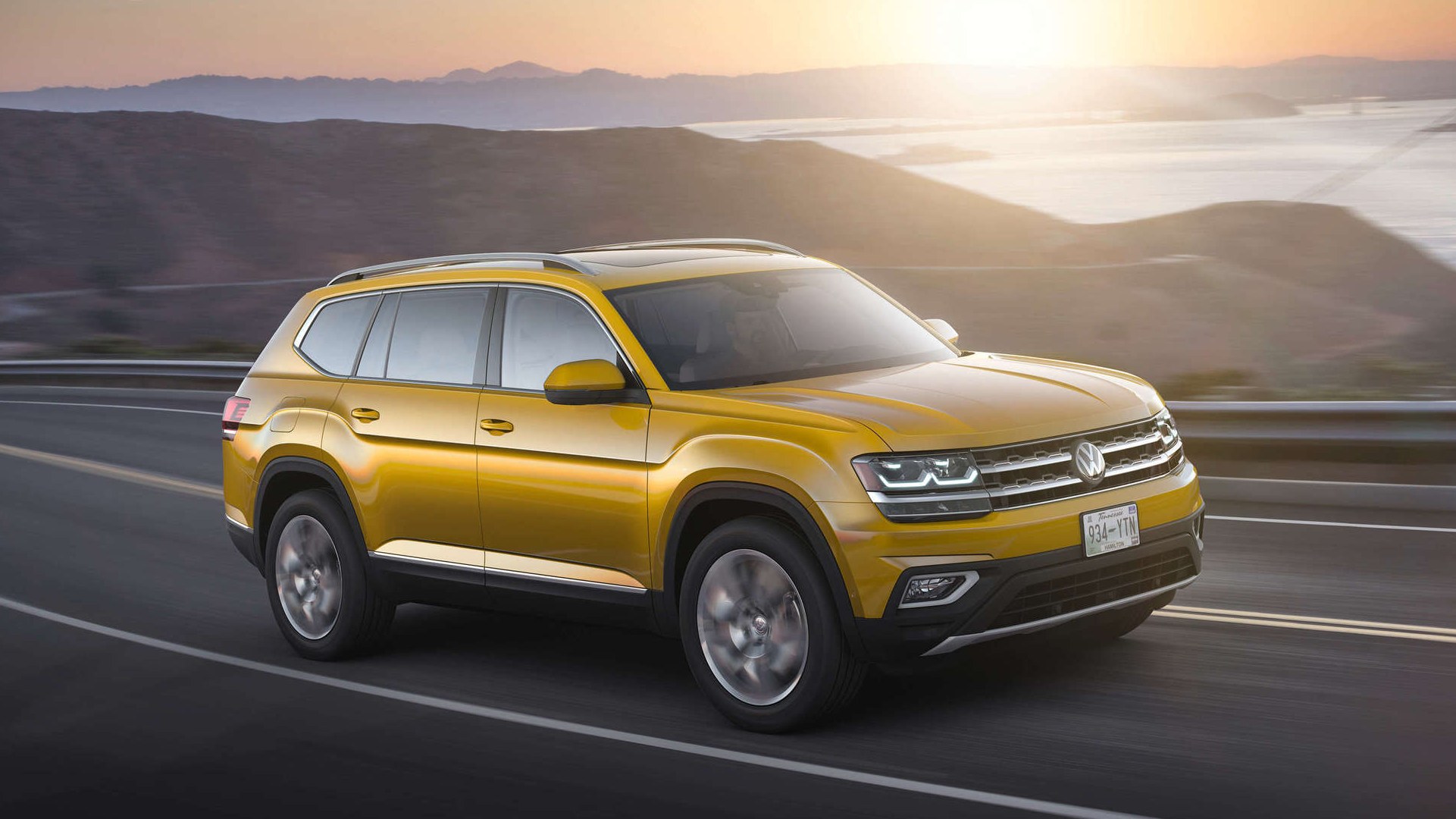 2018 Volkswagen Atlas driving on a highway near the Golden Gate Bridge