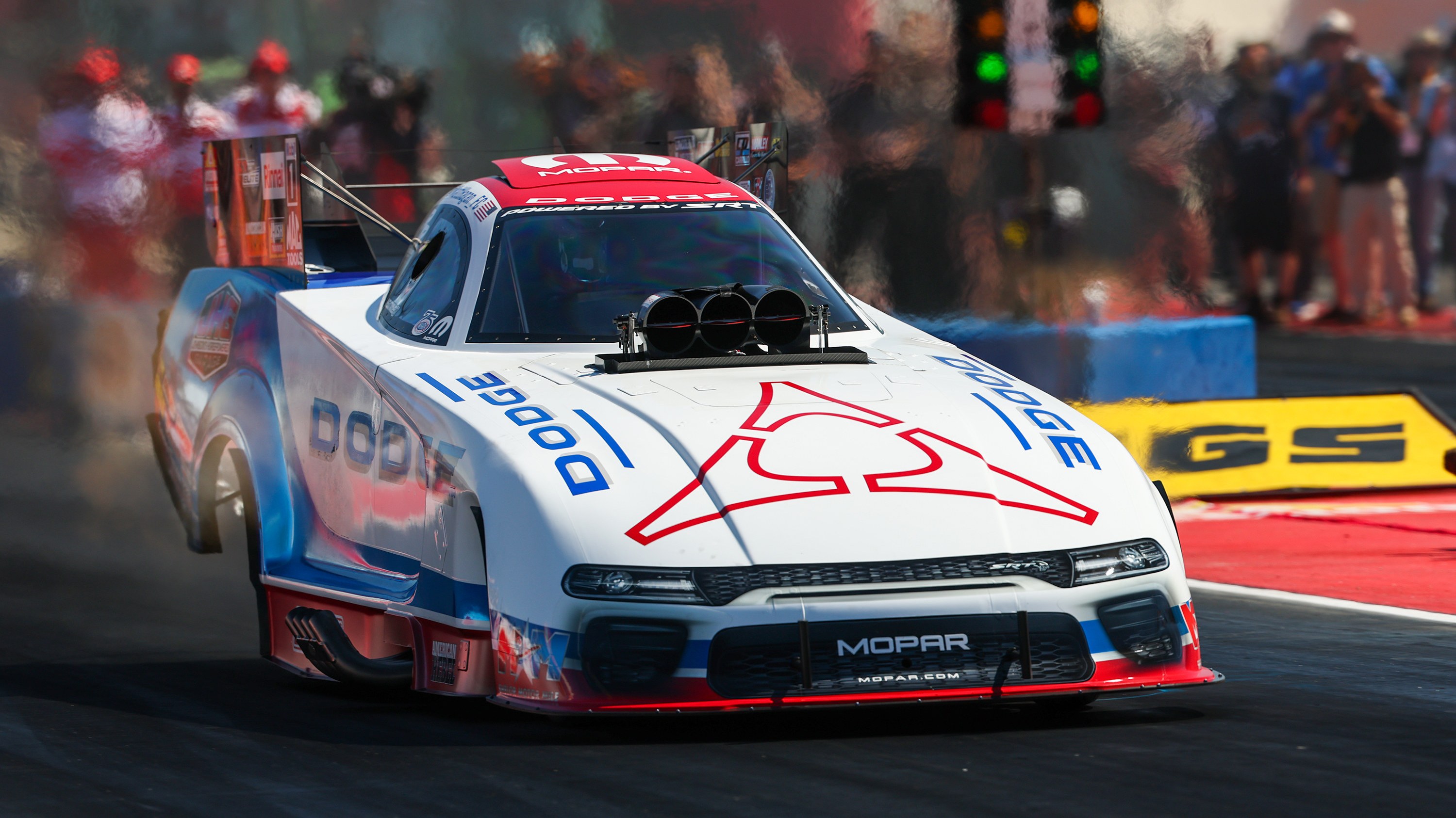 Matt Hagan's Dodge//SRT Hellcat Funny Car launching off the starting line