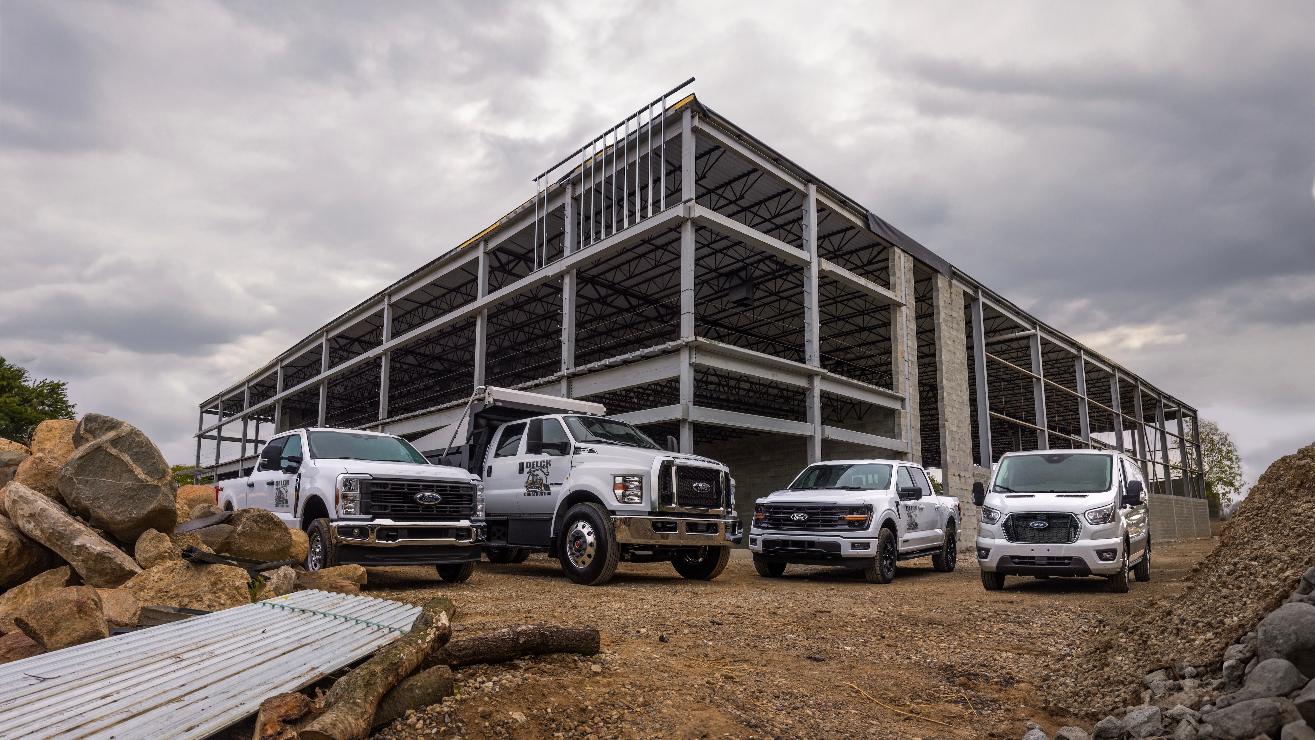 Ford Super Duty, F-750, F-150 and Transit parked at a construction site