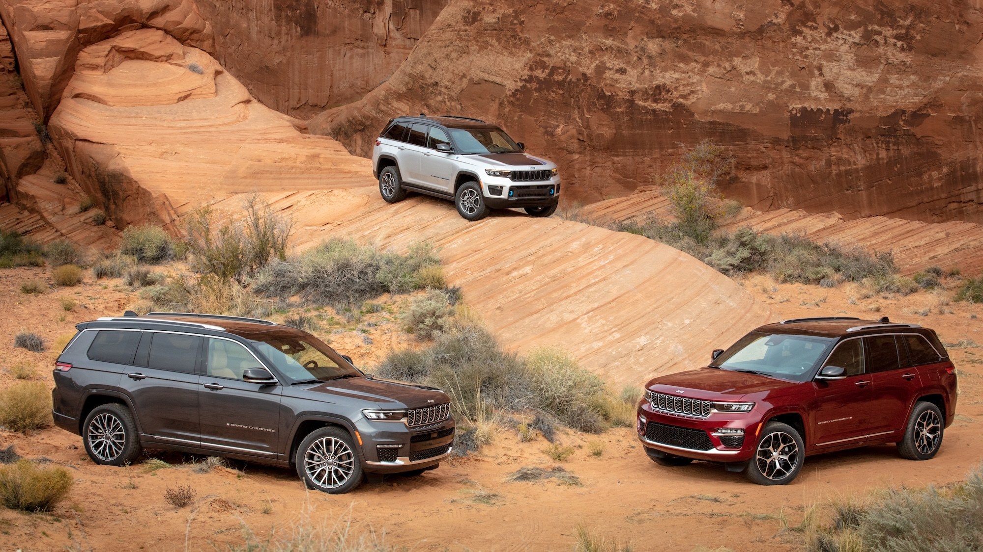 023 Jeep Grand Cherokee, Grand Cherokee L, and Grand Cherokee 4xe on red rock