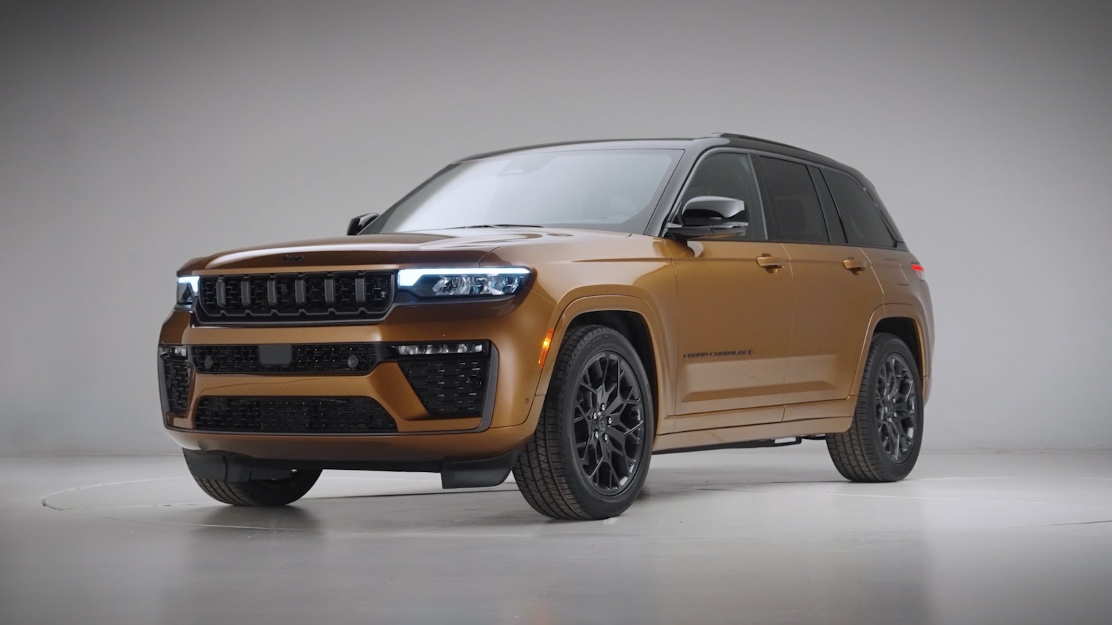 2026 Jeep Grand Cherokee front three-quarter view in studio