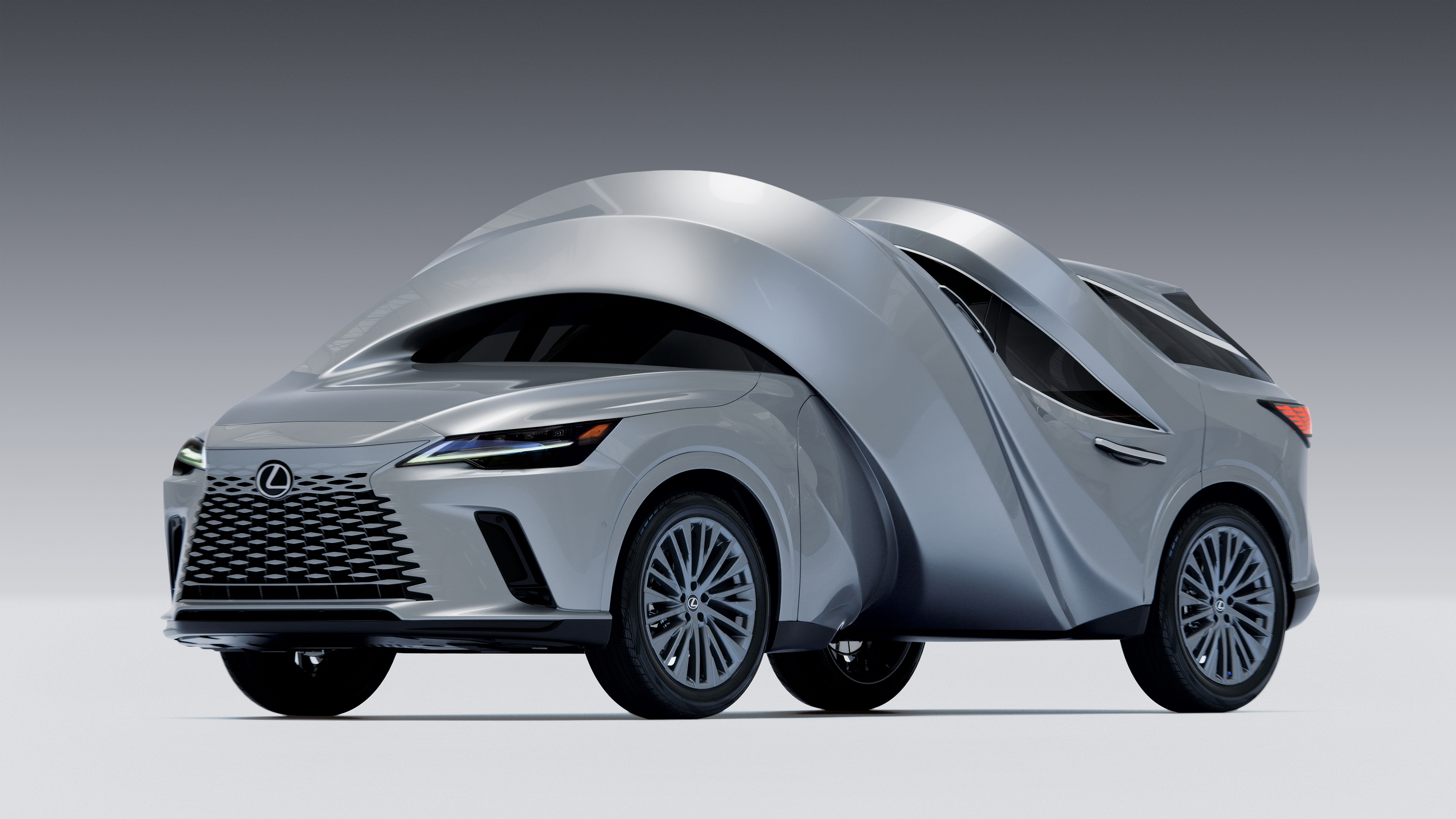 Lexus RX 450h+ twisted into a spiral sculpture by MSCHF, front three-quarter view