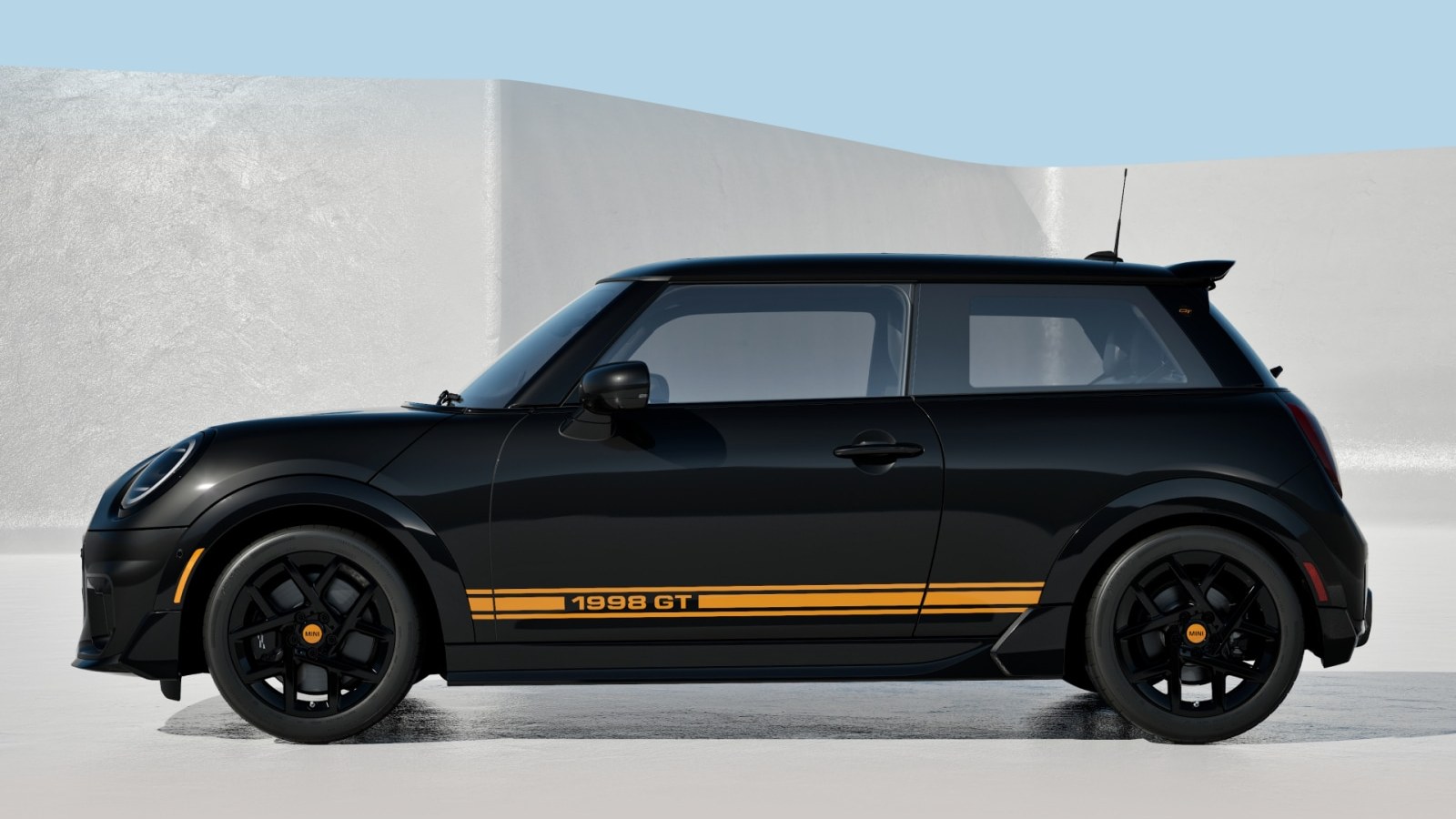 MINI 1998 GT Edition side profile in Midnight Black Metallic with orange GT stripes