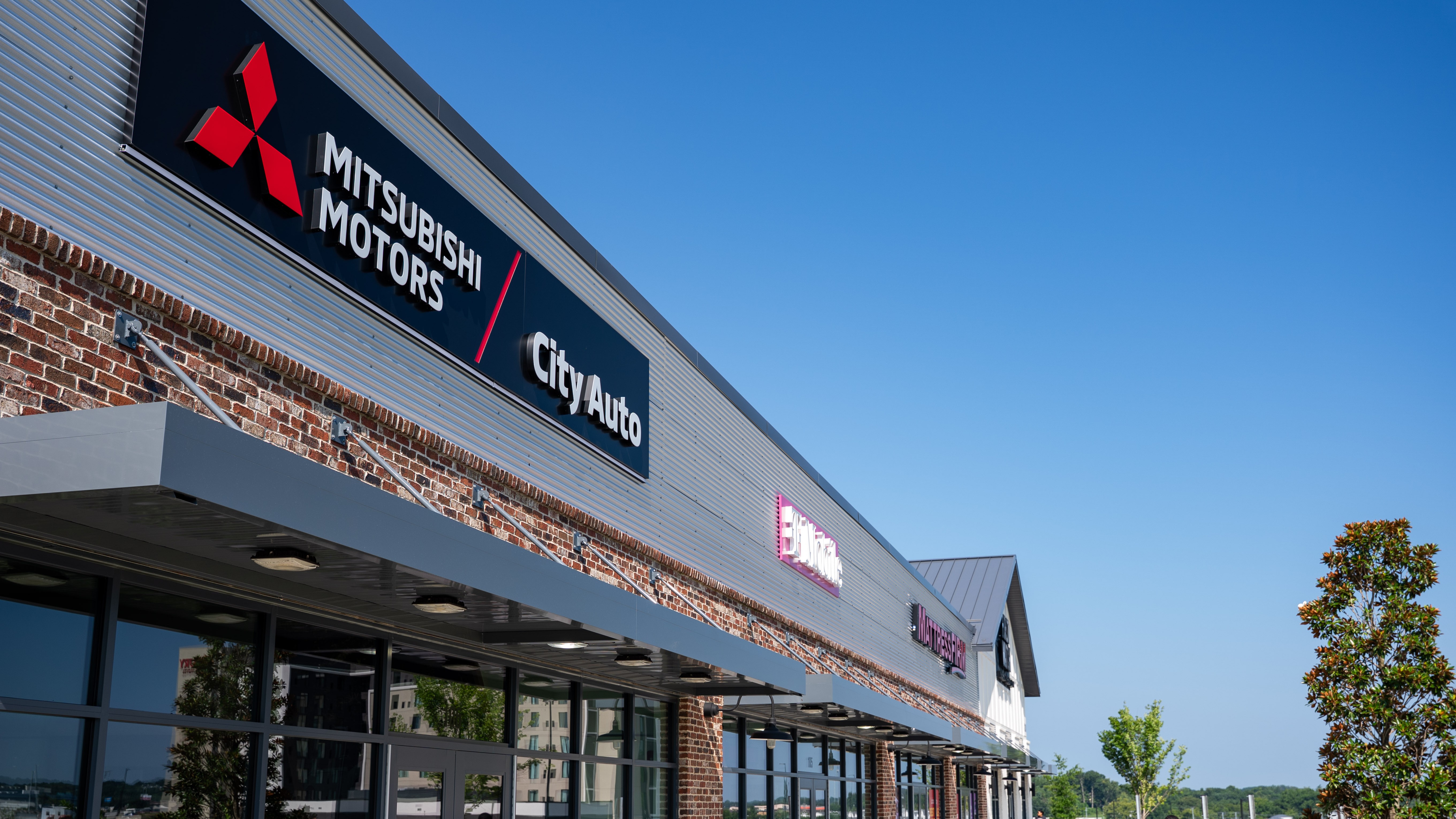 Mitsubishi Motors Gallery storefront at Century Farms retail center in Antioch, Tennessee