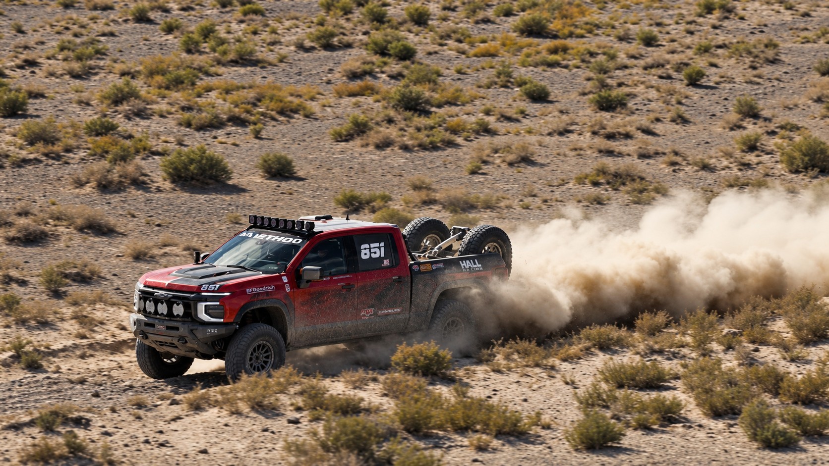 2027 Chevrolet Silverado ZR2 race truck sliding through Nevada desert