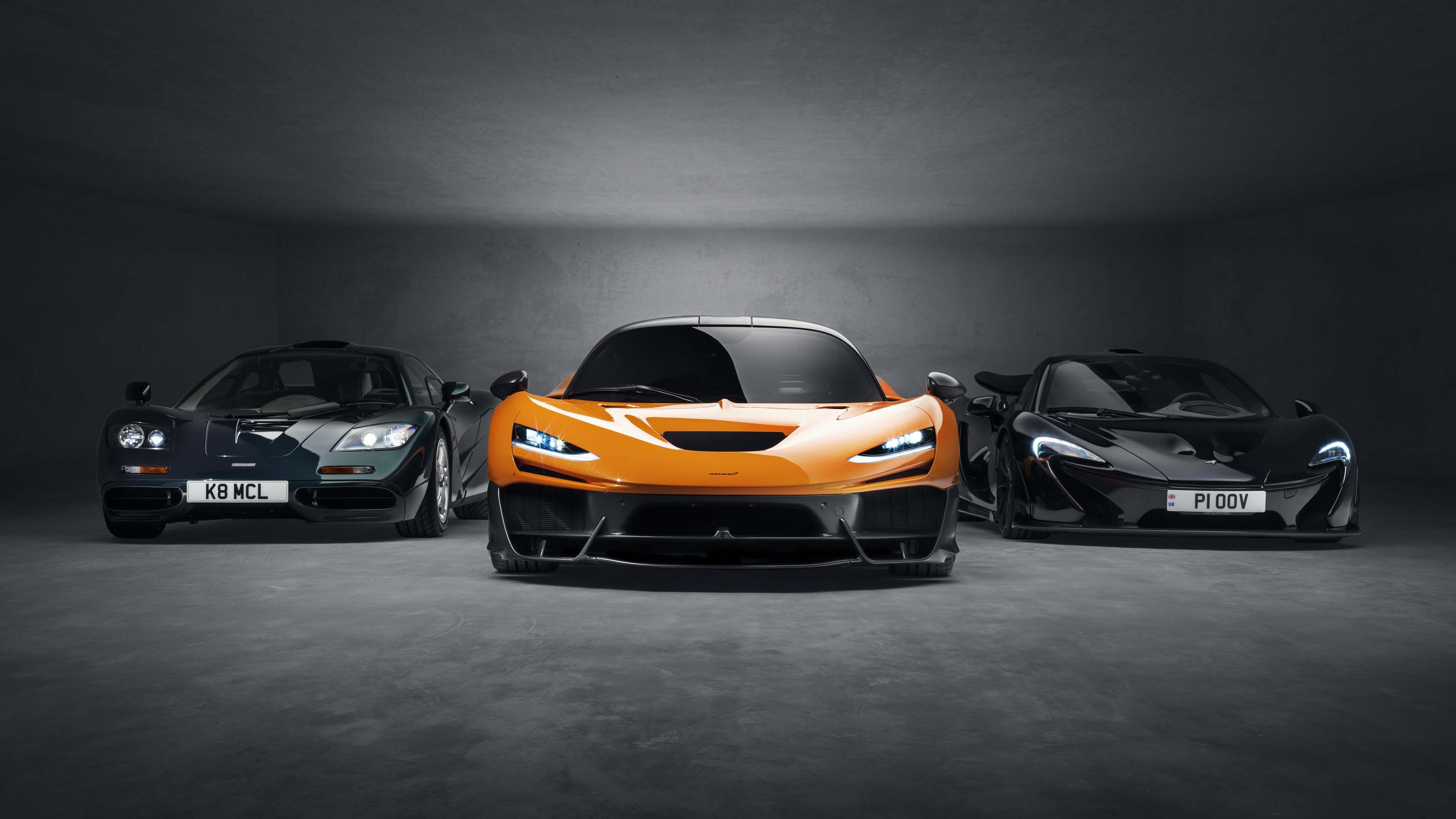 McLaren W1 hypercar between the F1 and P1 in a dark studio
