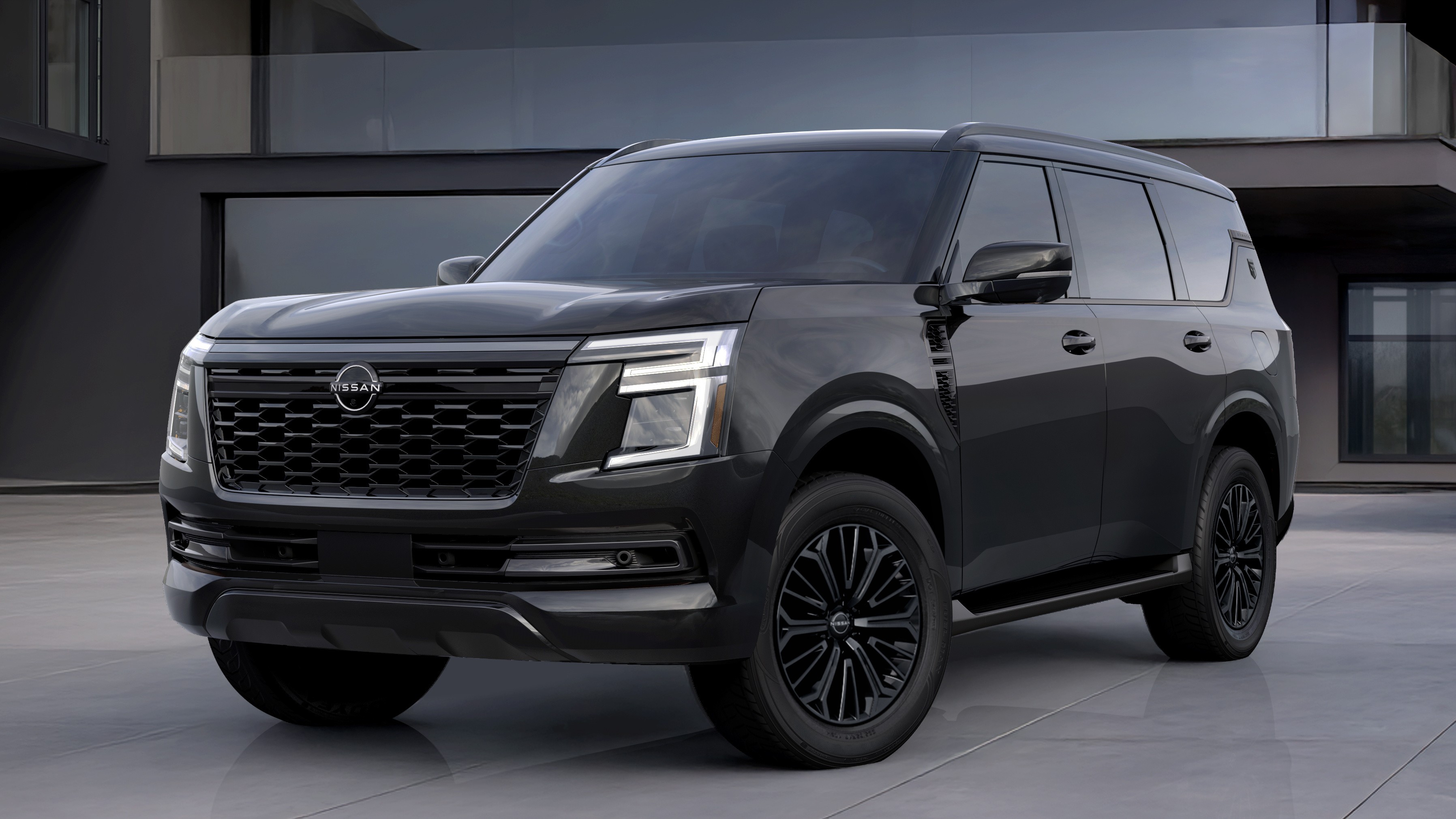 2027 Nissan Armada Dark Armor front view with black 20-inch wheels