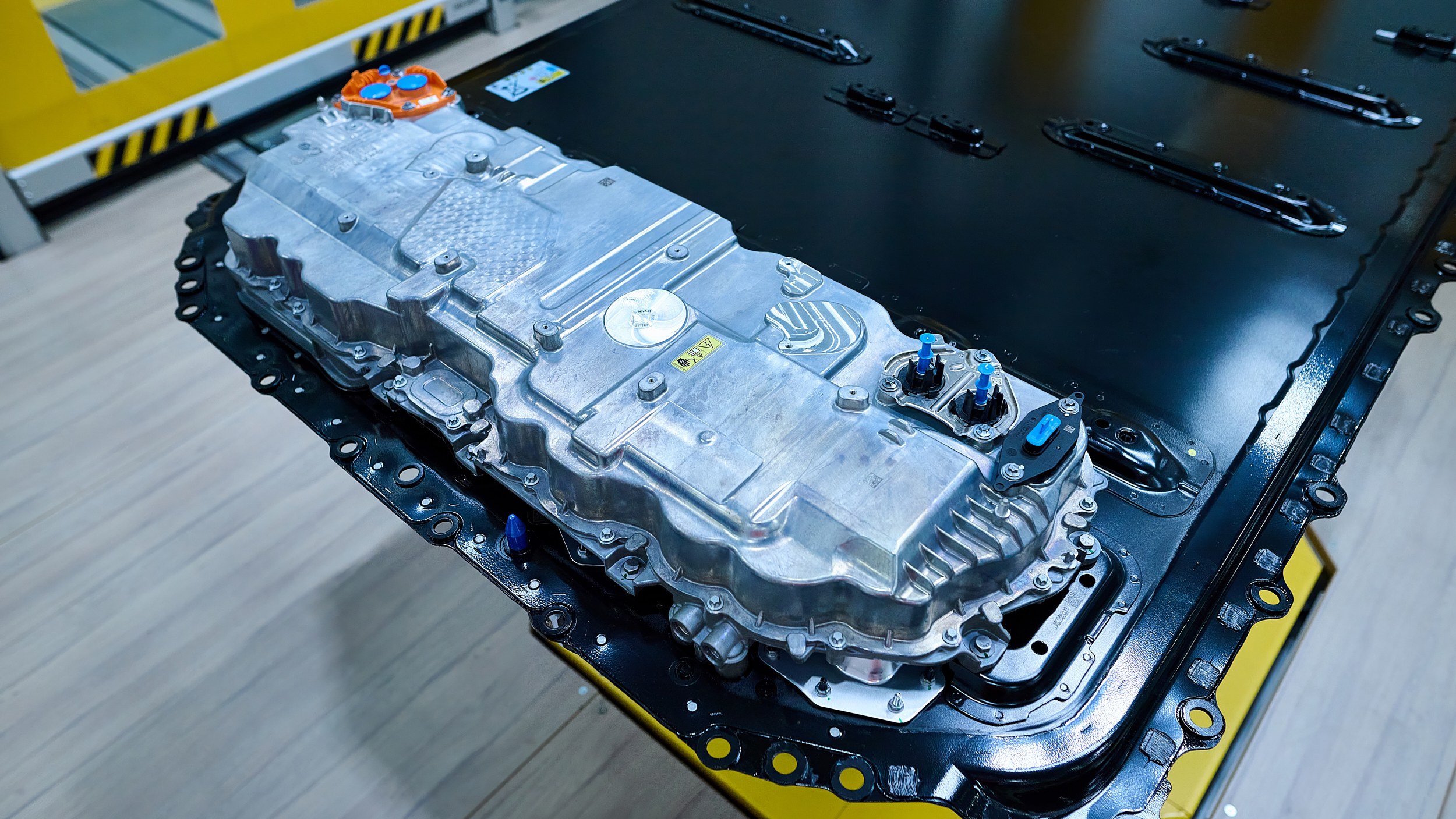 BMW Gen6 high-voltage battery pack close-up on production line