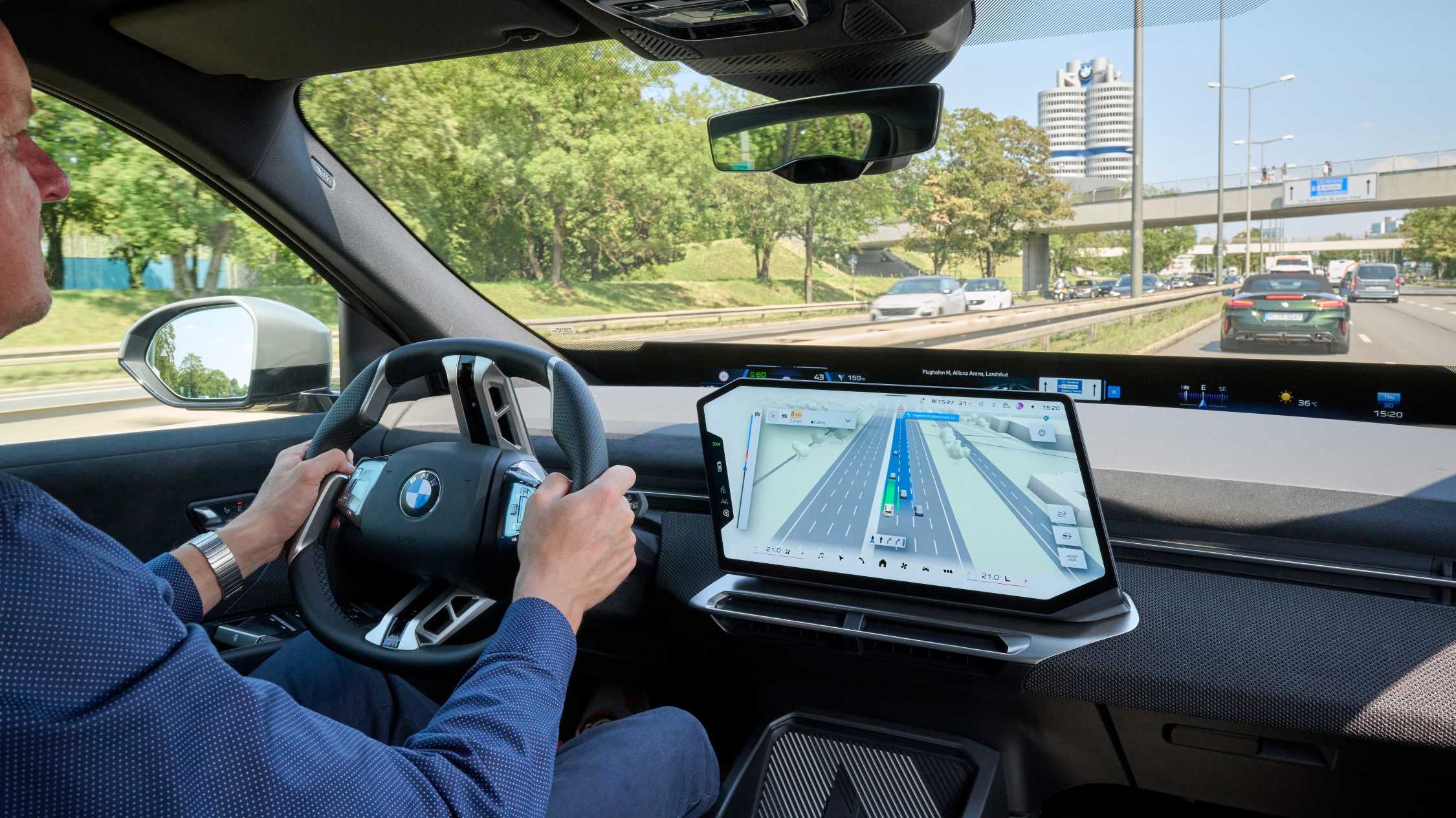 BMW Maps 3D view showing lanes and traffic on a highway near BMW headquarters