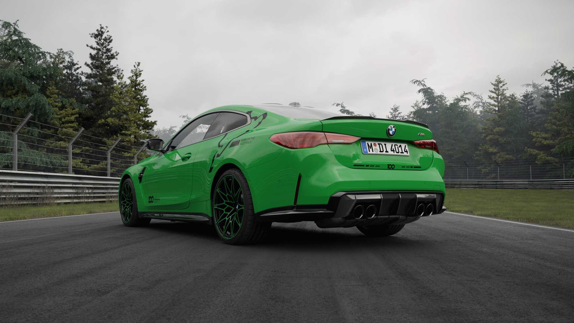 BMW M4 Coupé 100 Jahre Nürburgring edition in Nürburgring Green, rear three-quarter view