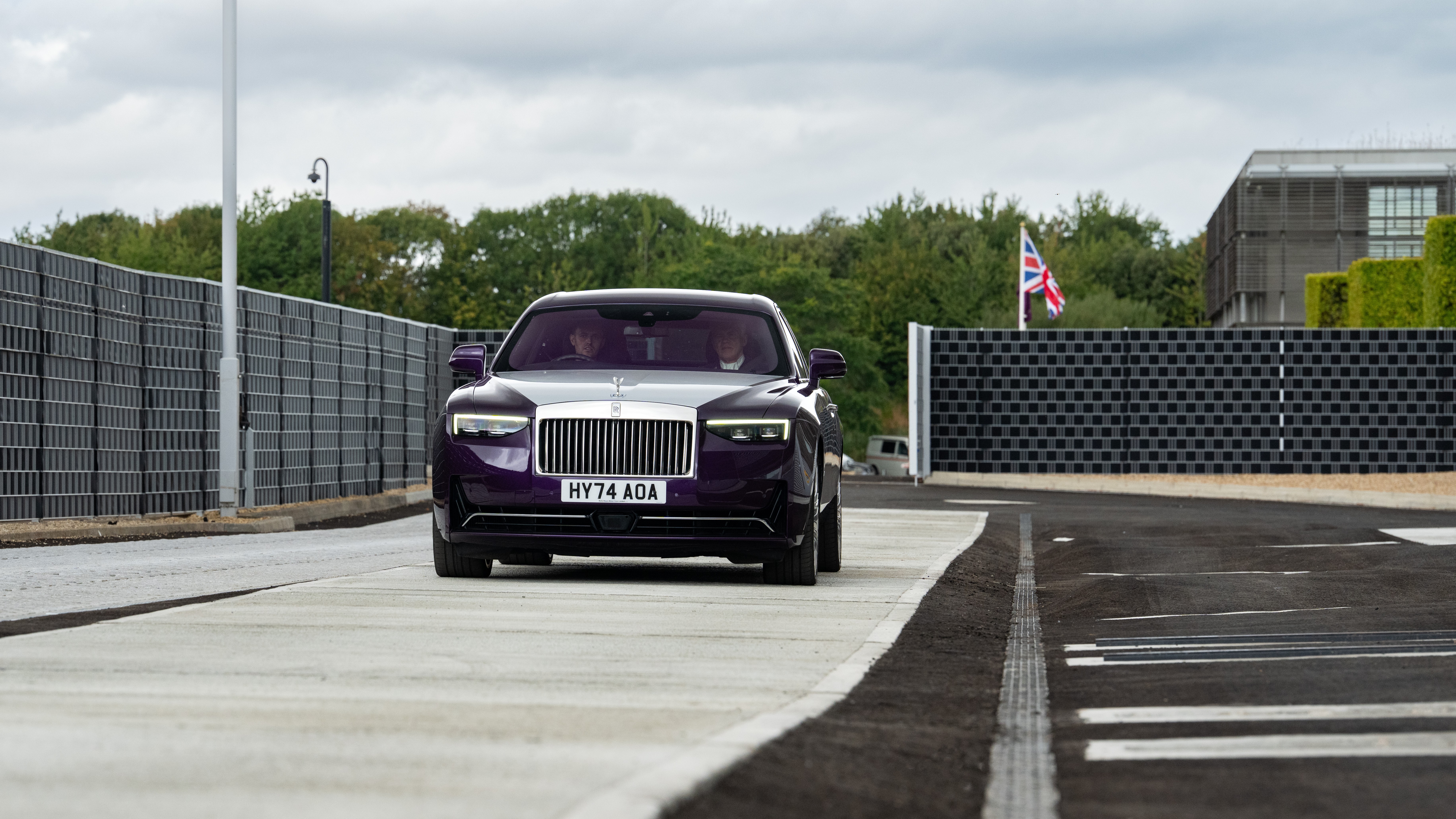 Purple Rolls-Royce sedan driving on the new Eric Platford Testway at Goodwood