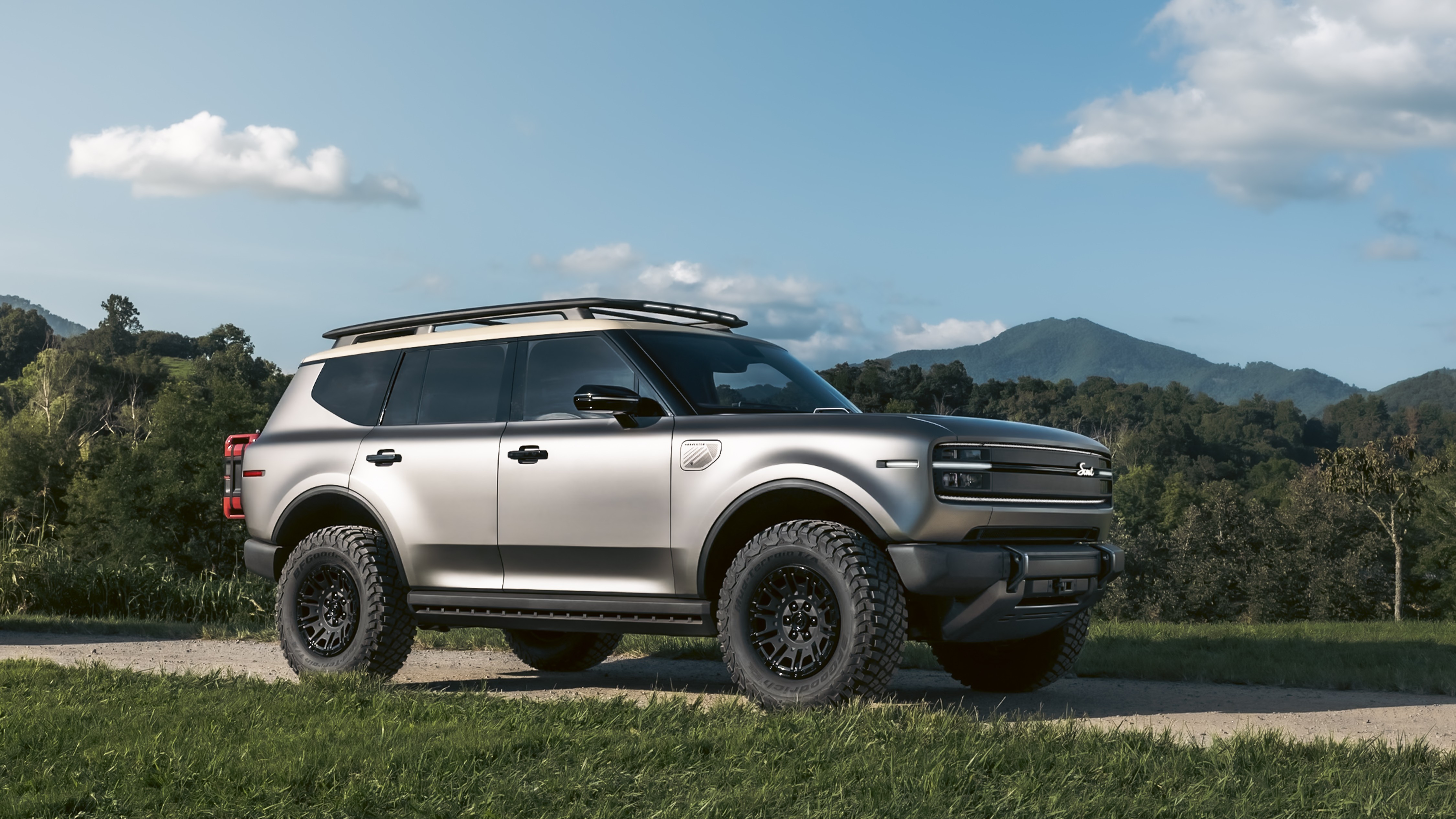 Scout Traveler trail-ready concept in Galvanized Steel, front three-quarter view