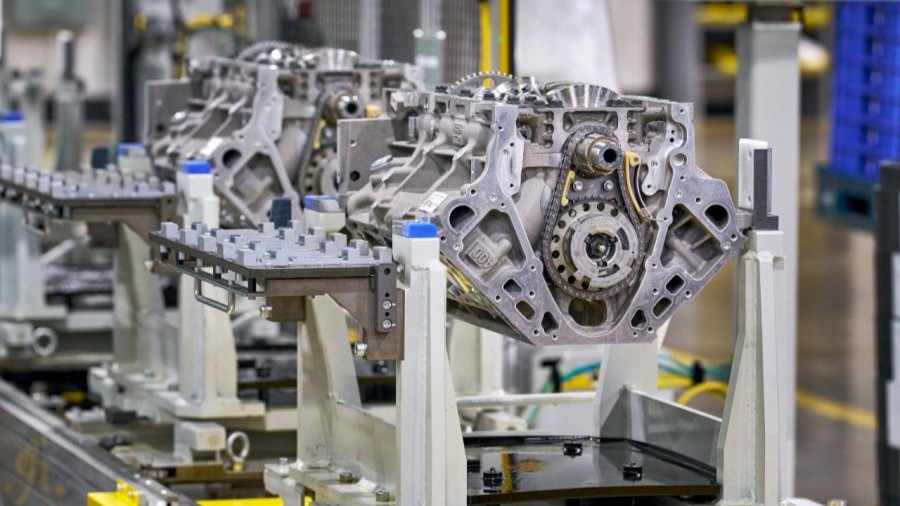 Bare sixth-generation GM V8 engine blocks with timing chains on the line