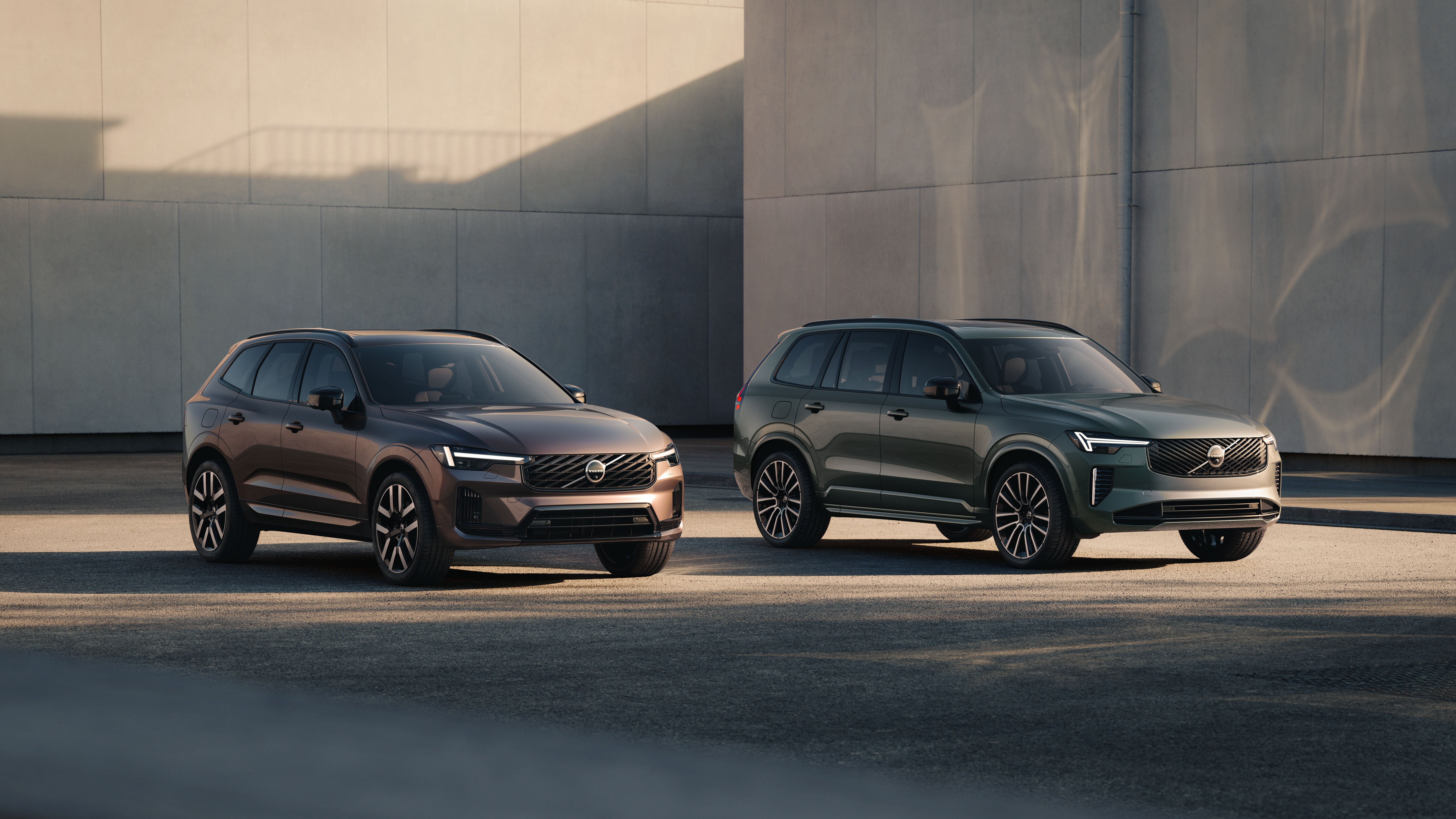 New Volvo XC60 and XC90 long-range plug-in hybrids parked together