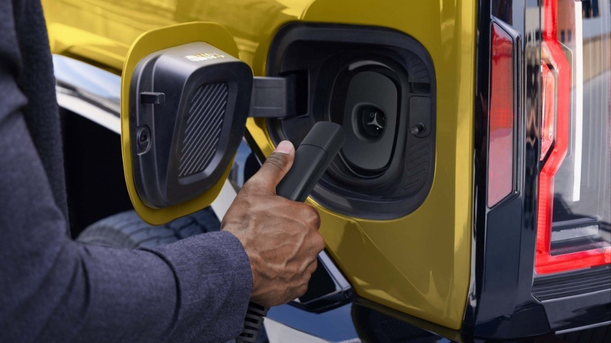 Factory NACS charging inlet on a GMC Hummer EV