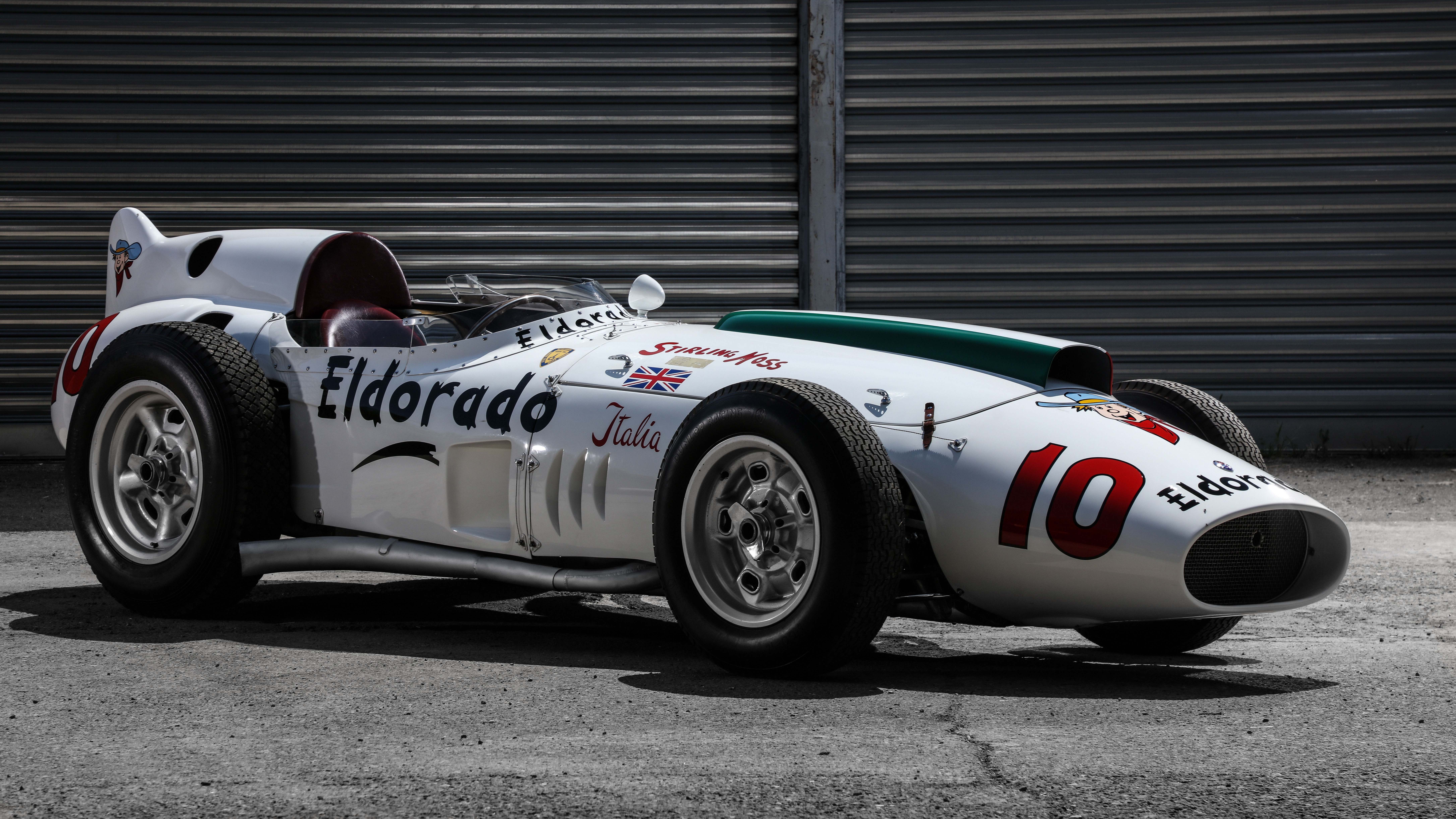 Maserati Eldorado race car in white 1958 sponsor livery, front three-quarter view