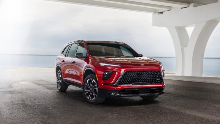 Red Buick Enclave Sport Touring three-row SUV, front three-quarter view