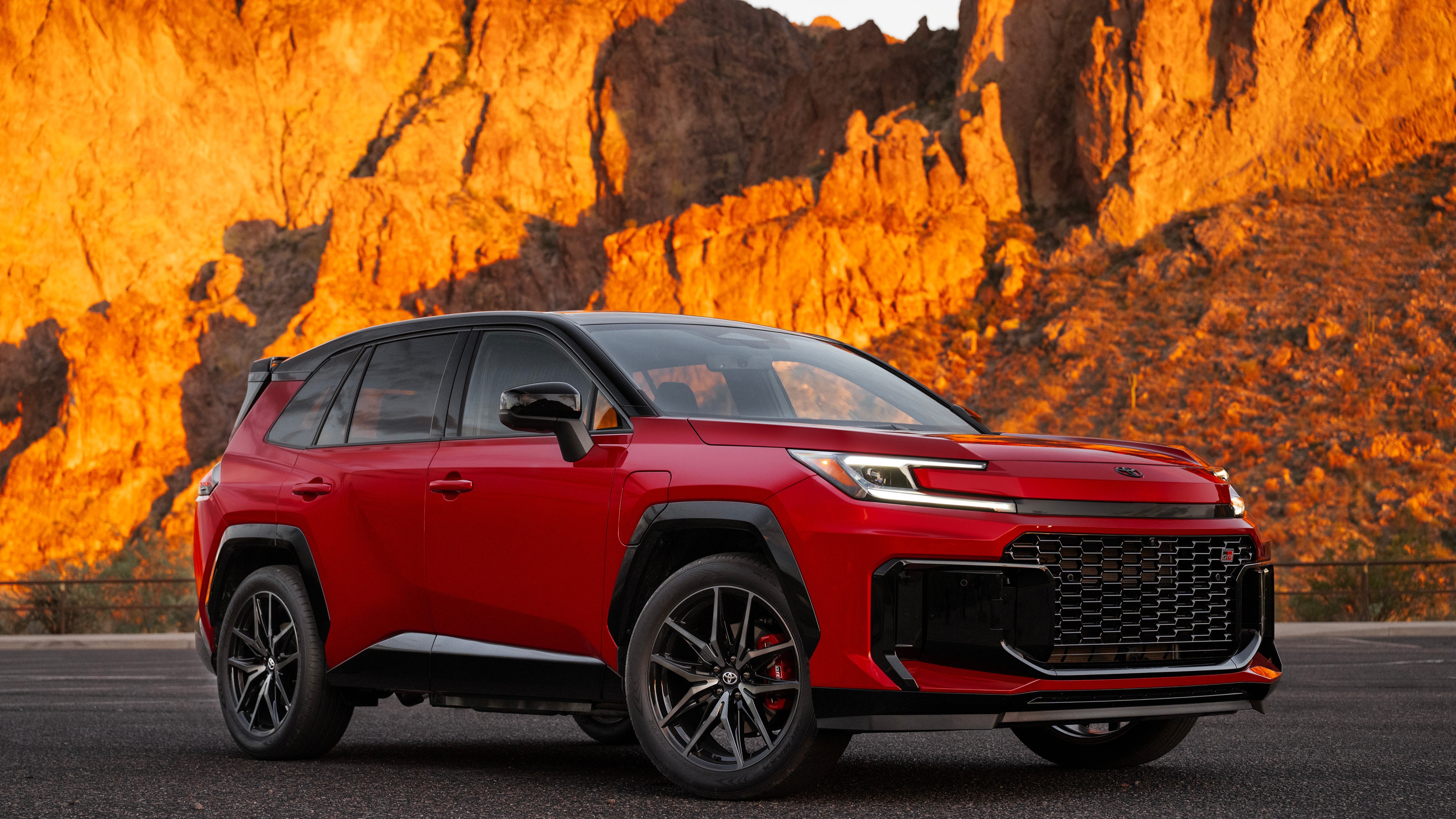 Red 2026 Toyota RAV4 Plug-in Hybrid GR Sport, front three-quarter view