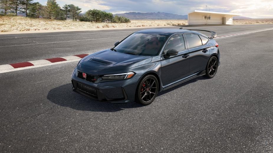 2027 Honda Civic Type R in dark gray, front three-quarter view on a racetrack