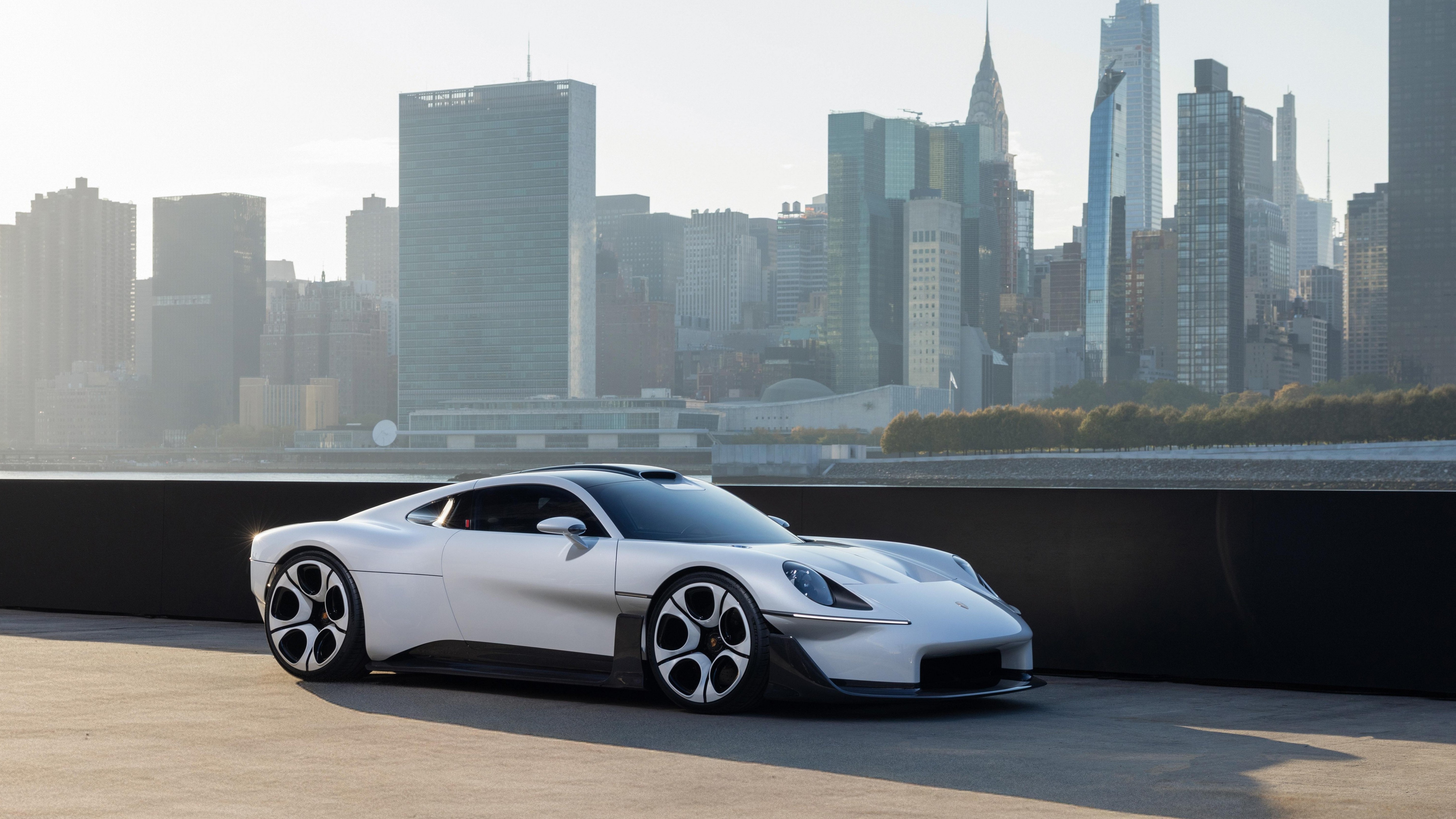 Porsche Mission S concept on a pier in Queens with the Manhattan skyline