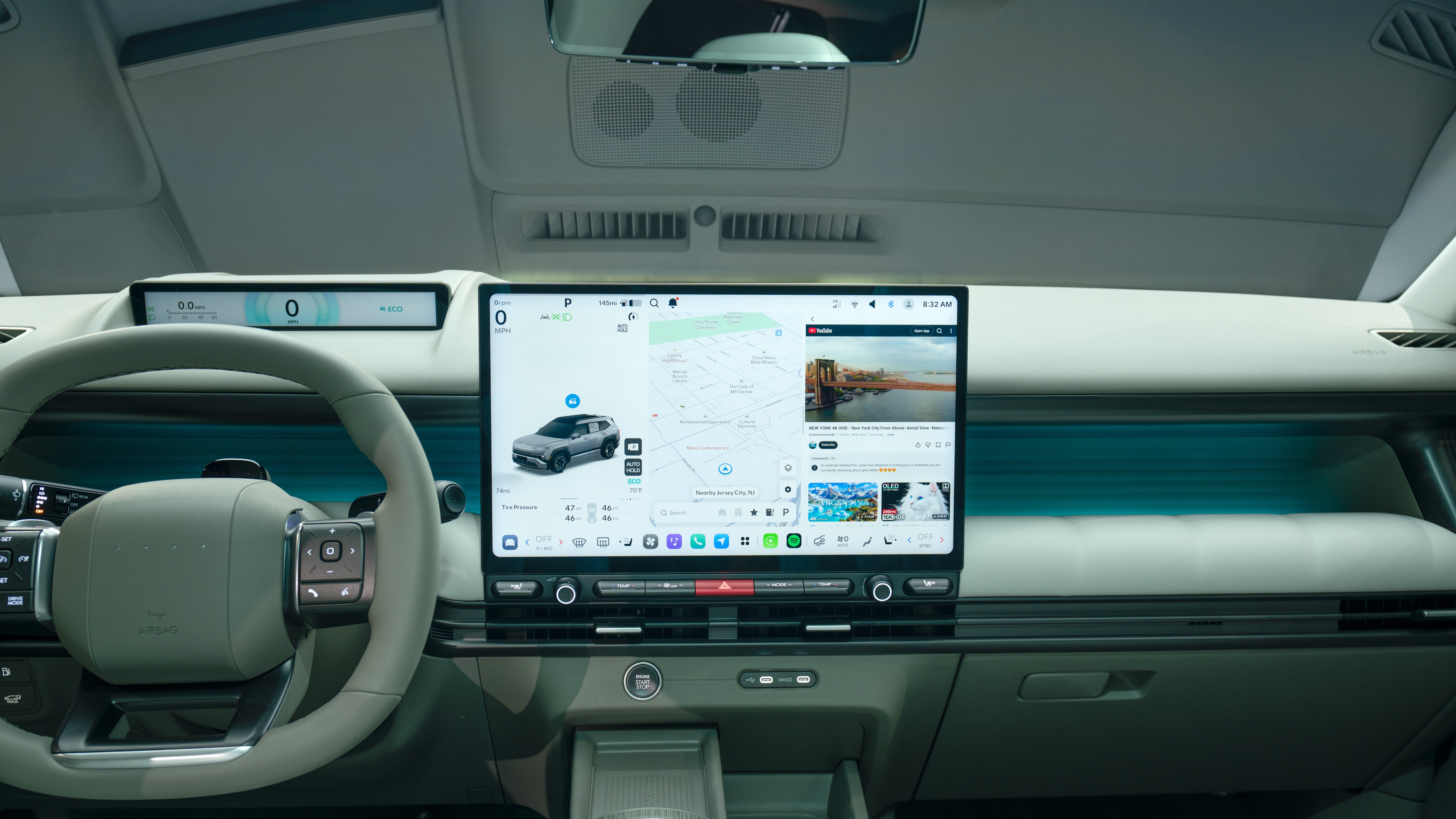2027 Hyundai Tucson dashboard with Pleos Connect touchscreen and slim driver display