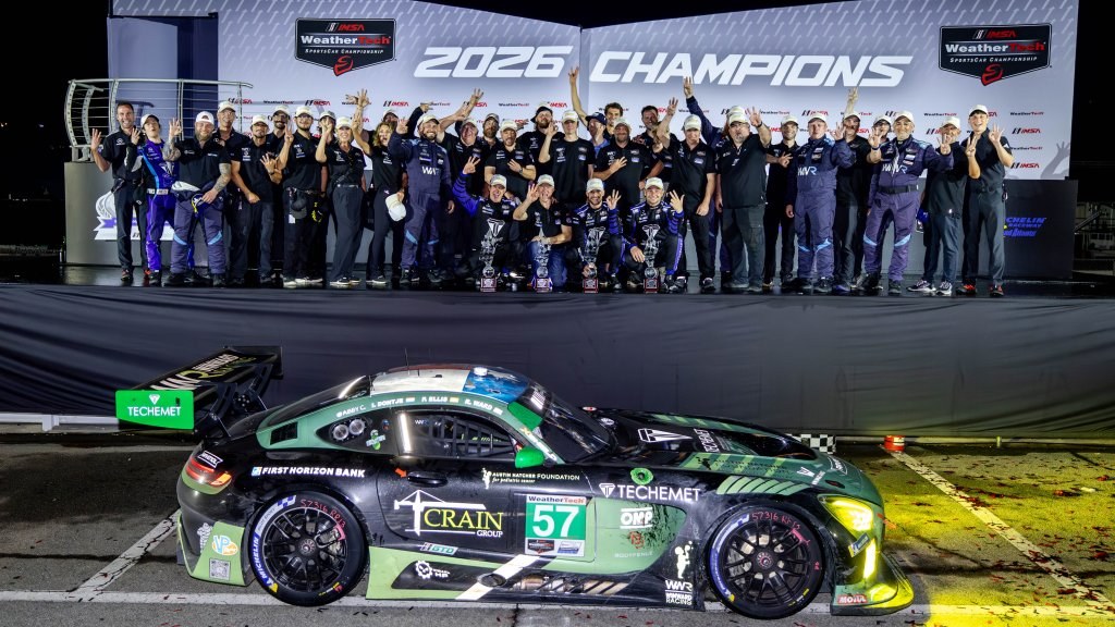 Winward Racing No. 57 Mercedes-AMG GT3 in front of IMSA champions stage