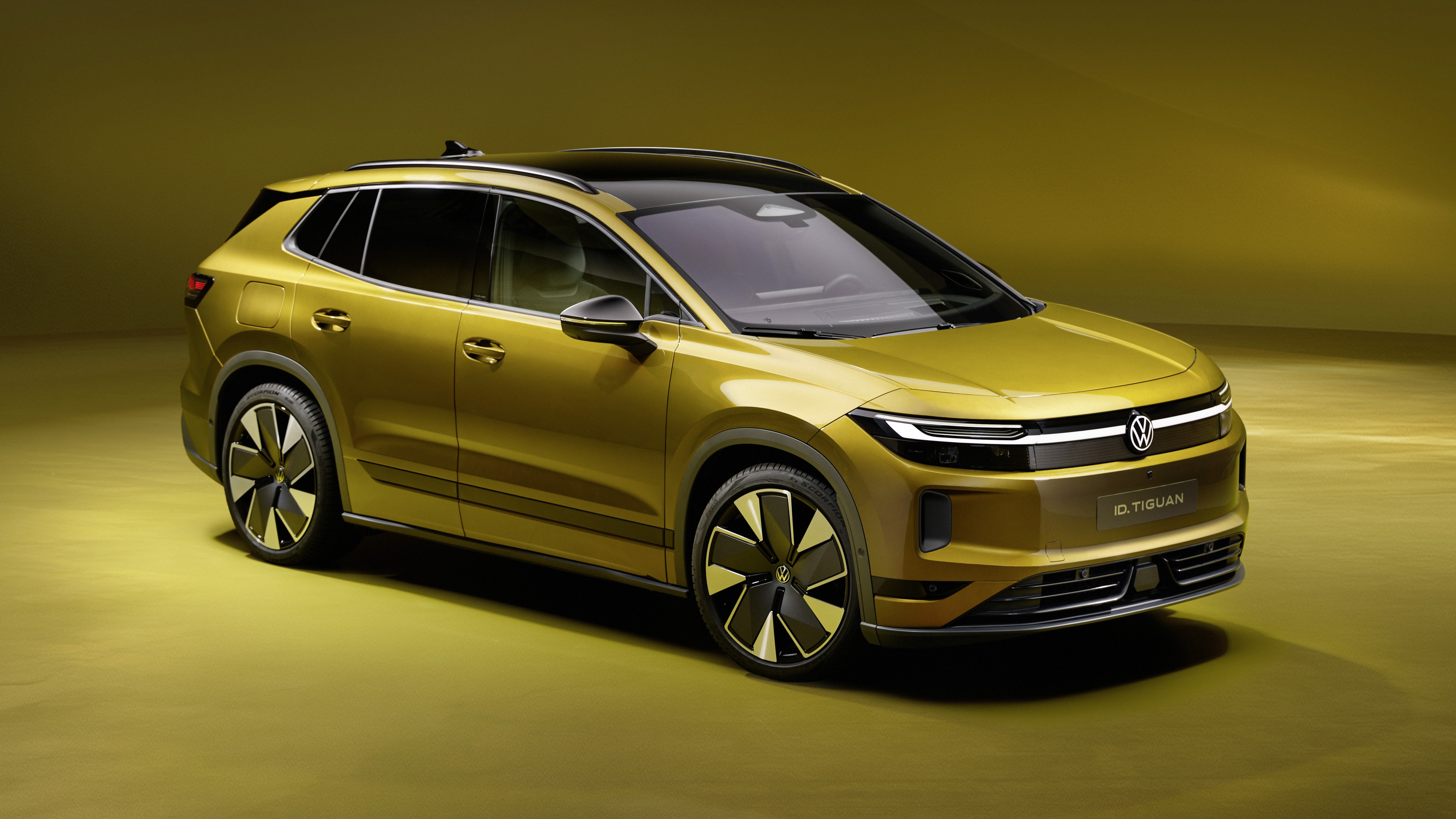 Gold Volkswagen ID. Tiguan electric SUV, front three-quarter view