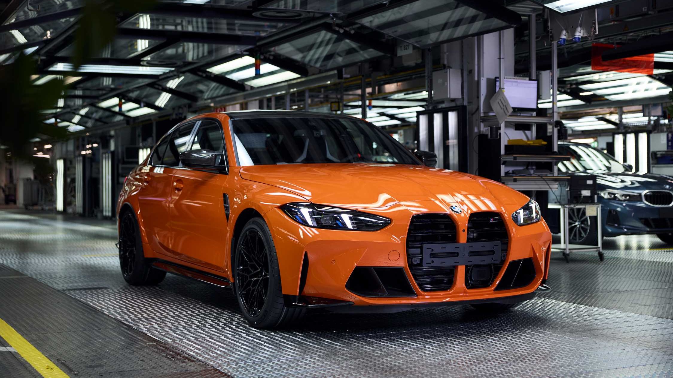 Fire Orange BMW M3 sedan, BMW M's one-millionth car, at Plant Munich
