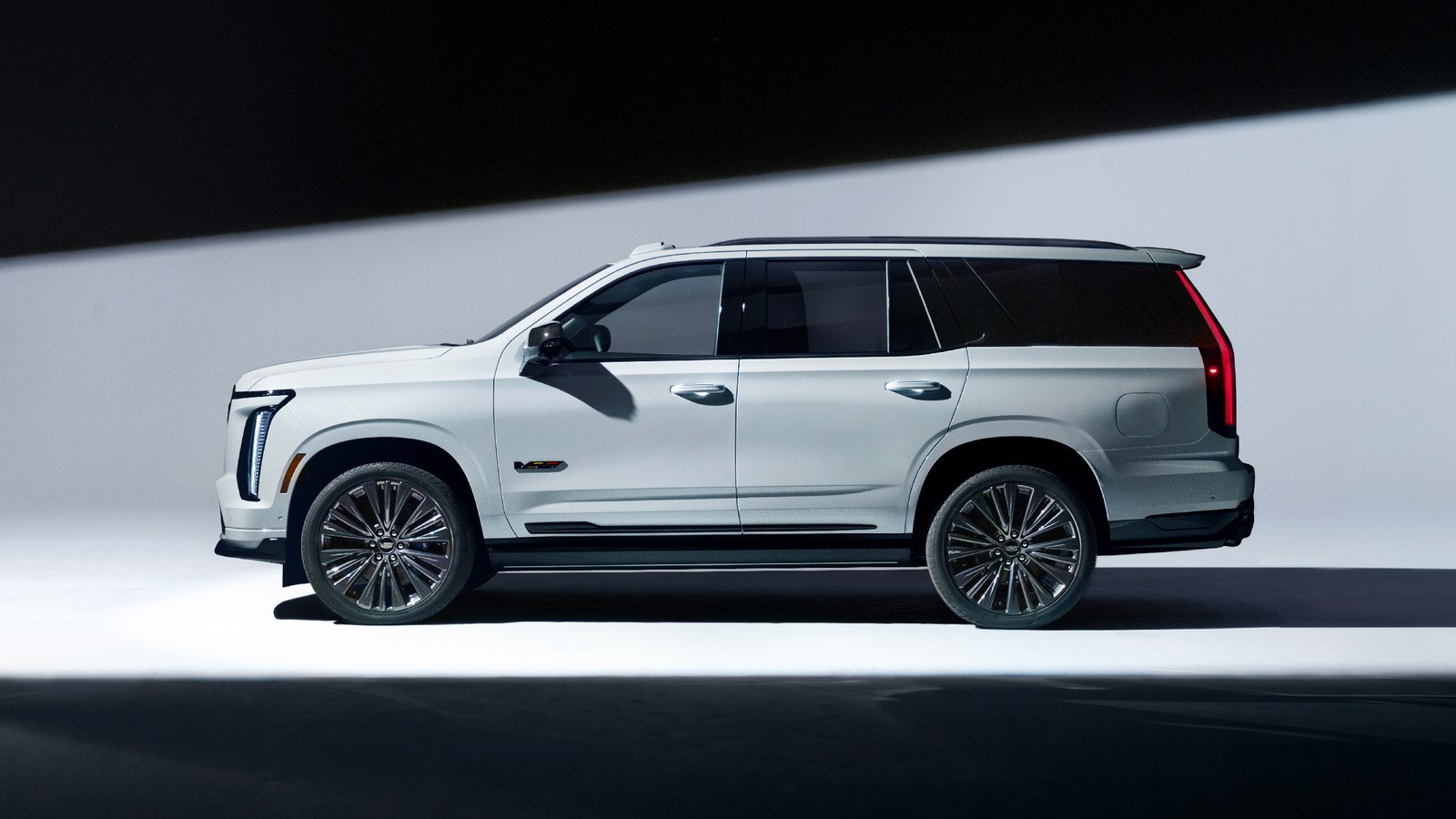 White 2027 Cadillac Escalade-V 125th Anniversary Collector Series in profile