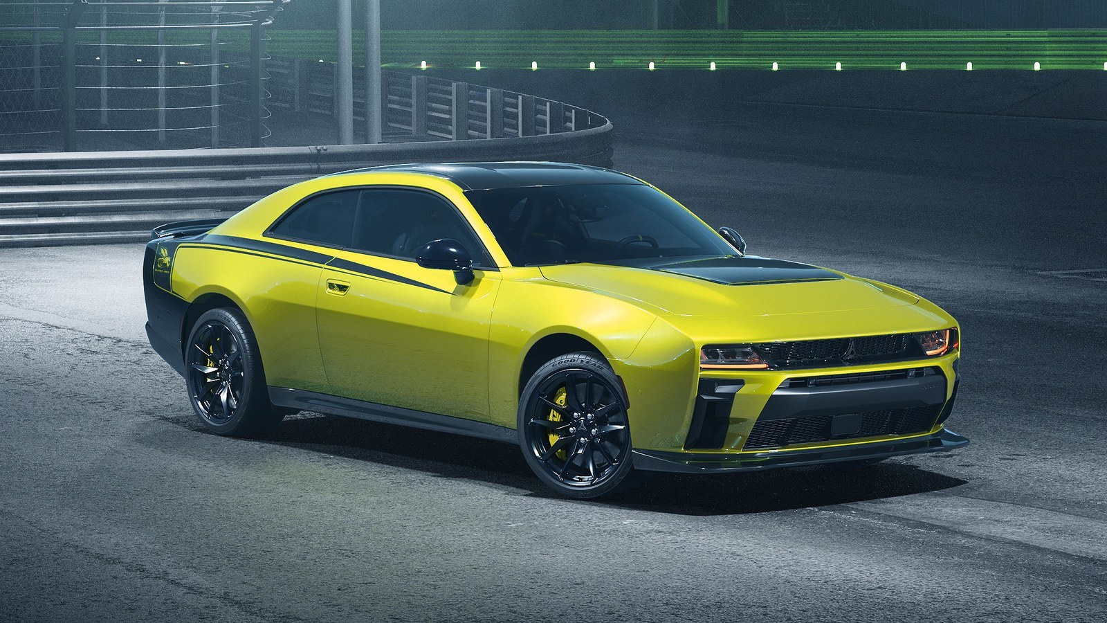 Yellow 2027 Dodge Charger Super Bee Launch Edition coupe on a track