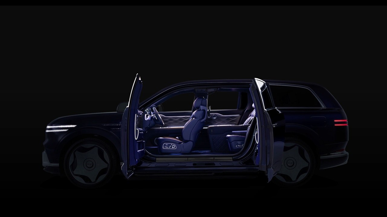 Genesis GV90 Neolun in profile with both coach doors open