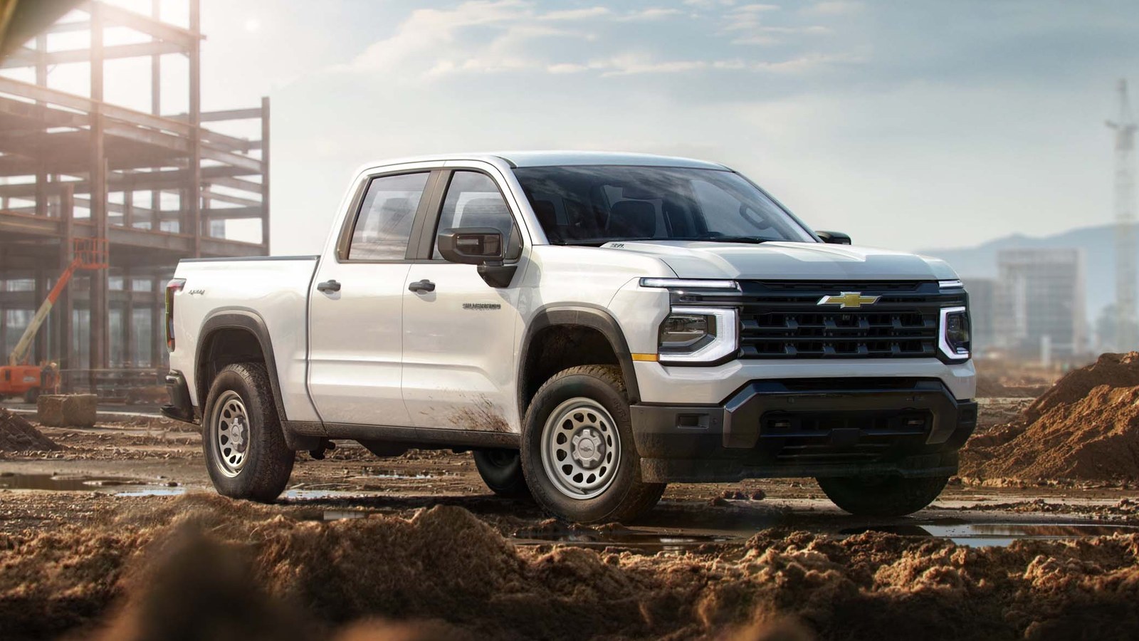 White 2027 Chevrolet Silverado Work Truck on a construction site