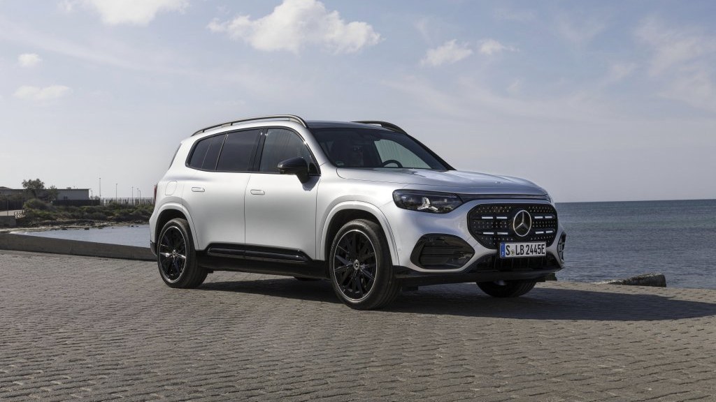 Silver new Mercedes-Benz GLB parked by the sea