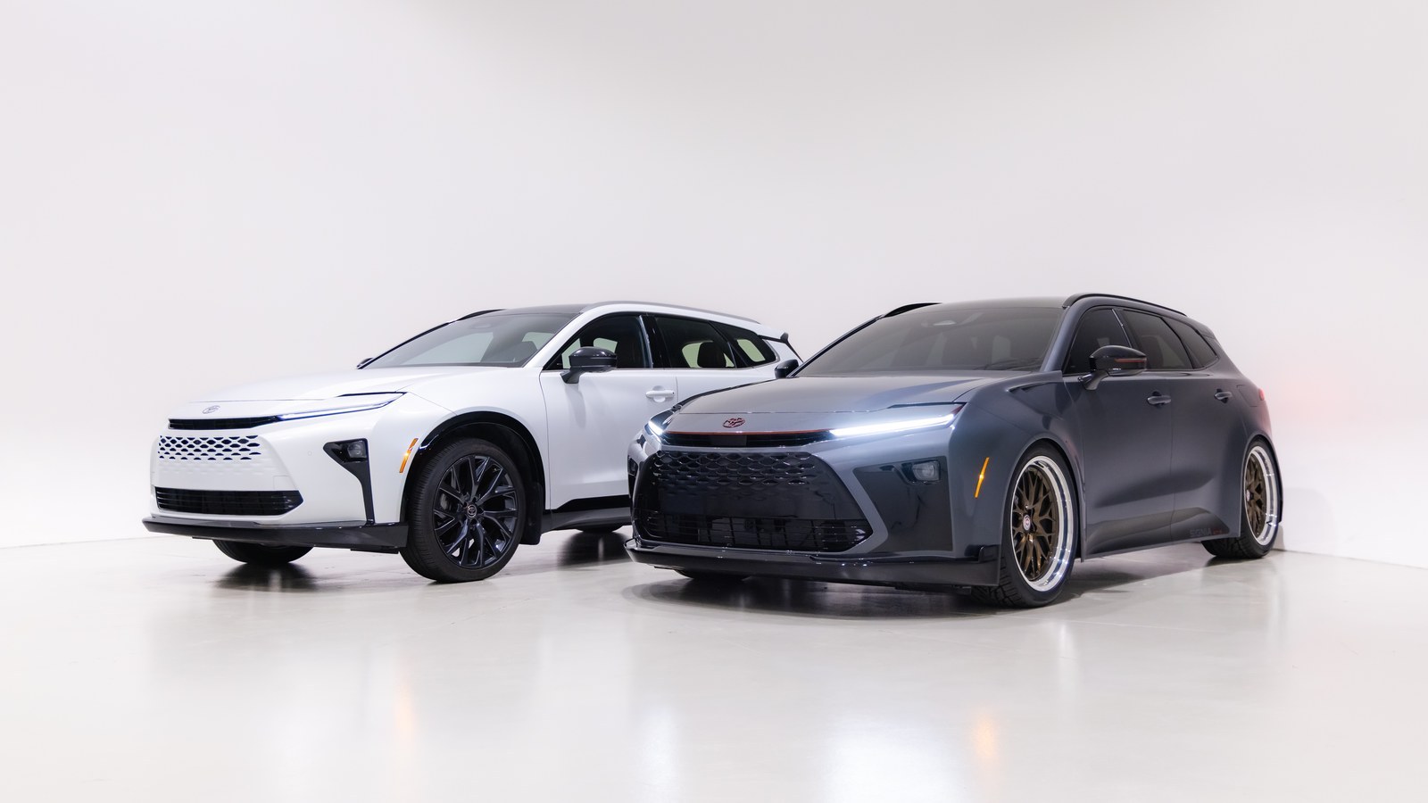 Toyota Crown Signia GT-S concept beside a stock white Crown Signia