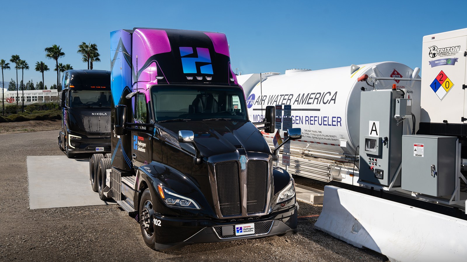 Toyota Hydrogen Solutions fuel cell truck beside a mobile hydrogen refueler